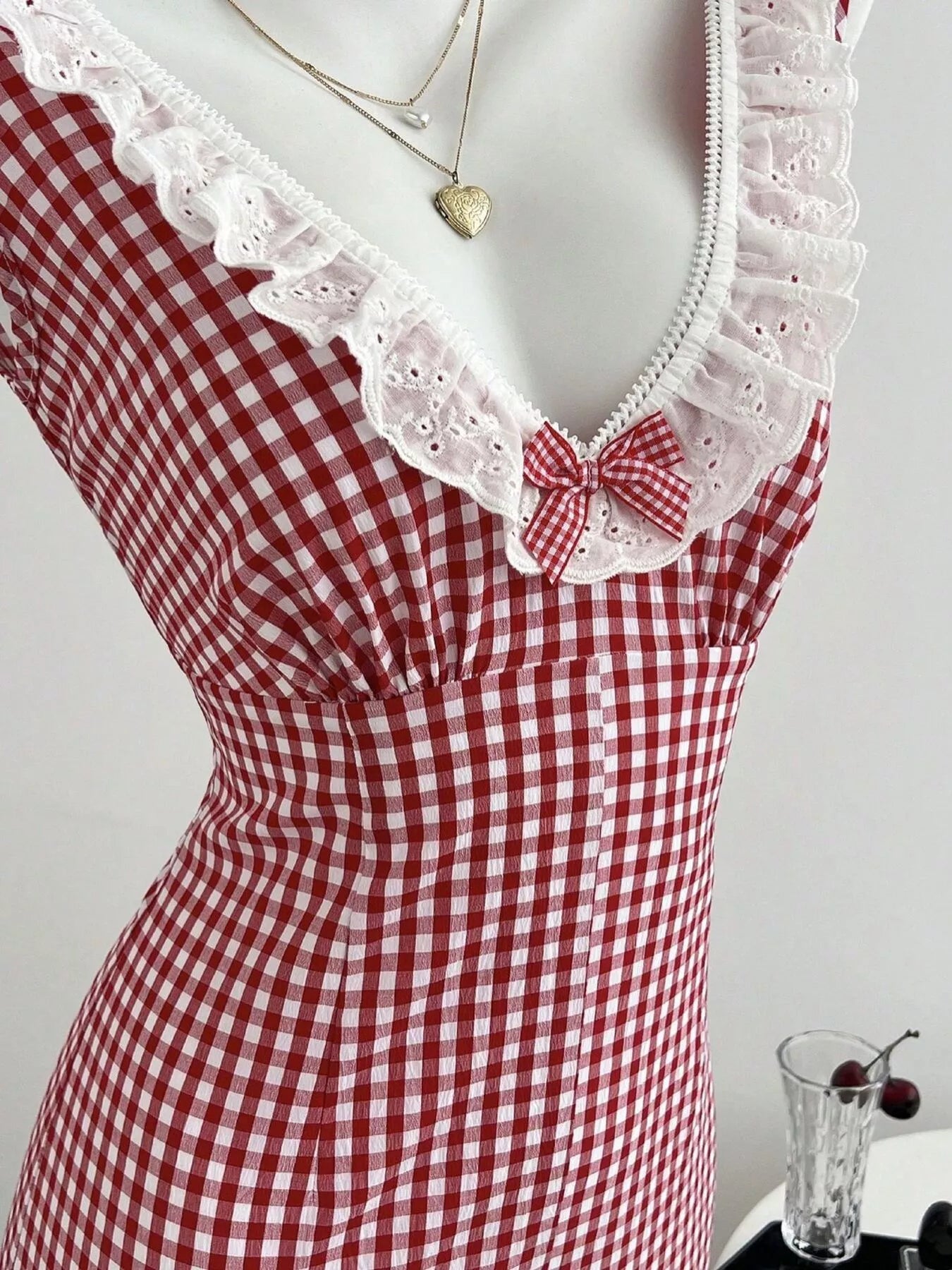 Trendsi Gingham Lace-Trimmed Romper with Bow Detail -