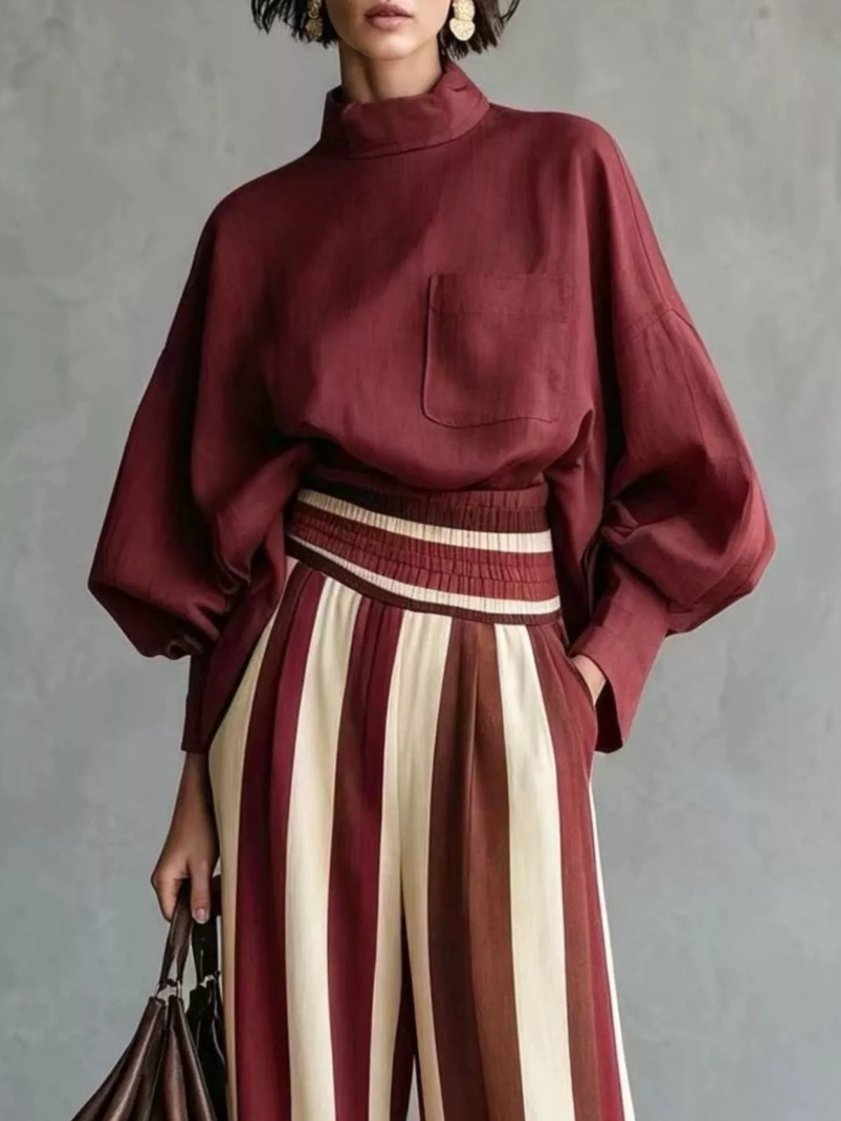 Burgundy mock-neck blouse and striped wide-leg trouser set — design and construction details