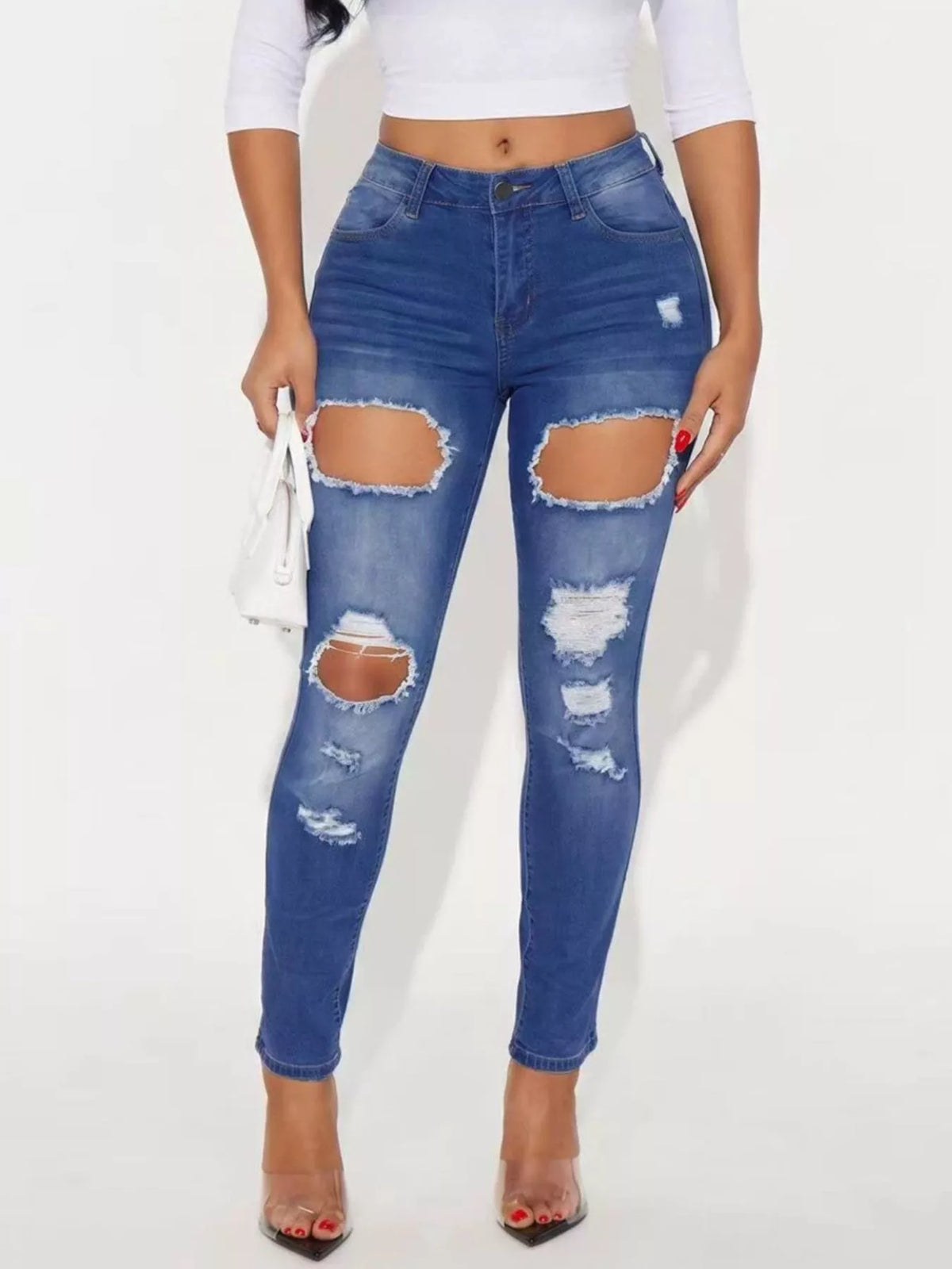 High-Waisted Distressed Skinny Jeans in blue, front view
