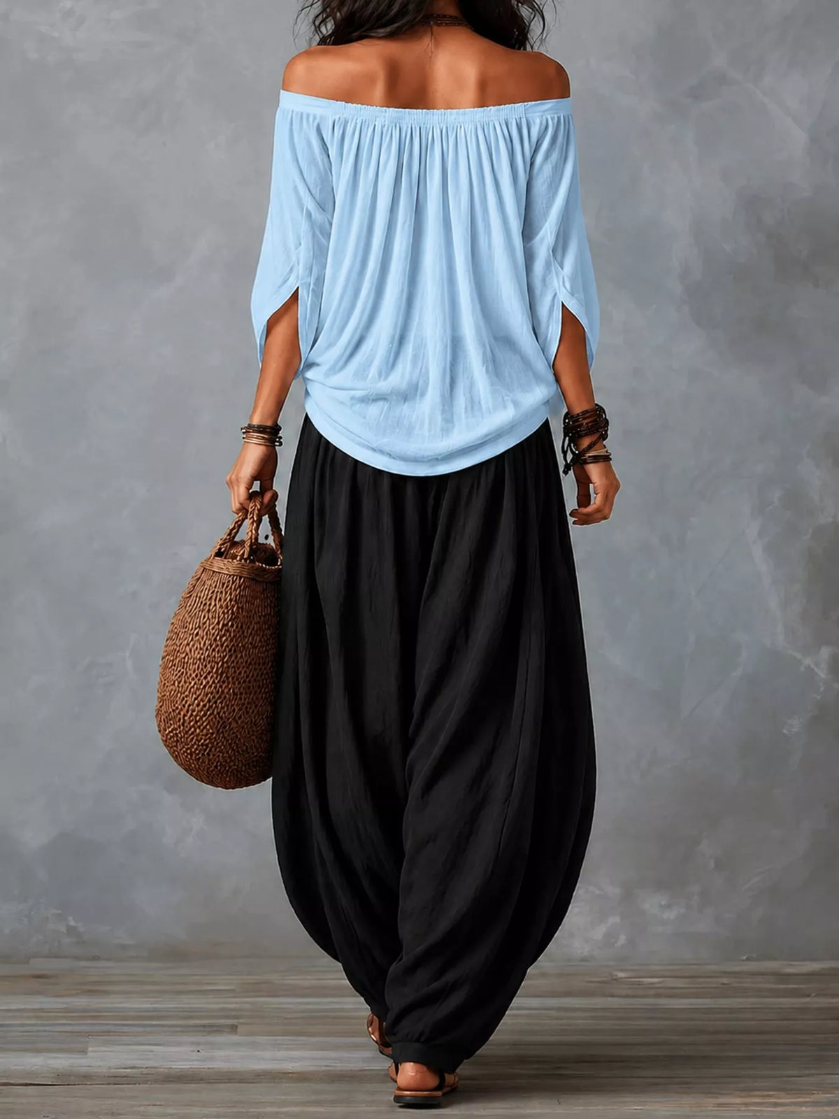 Light blue top and black pants off-shoulder top and wide-leg harem pants set — back view