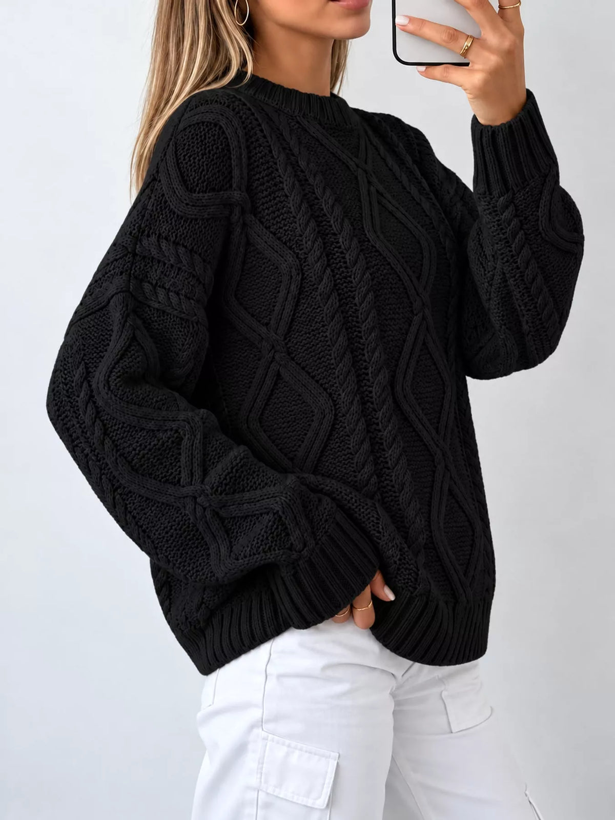 Black cable-knit round neck sweater
