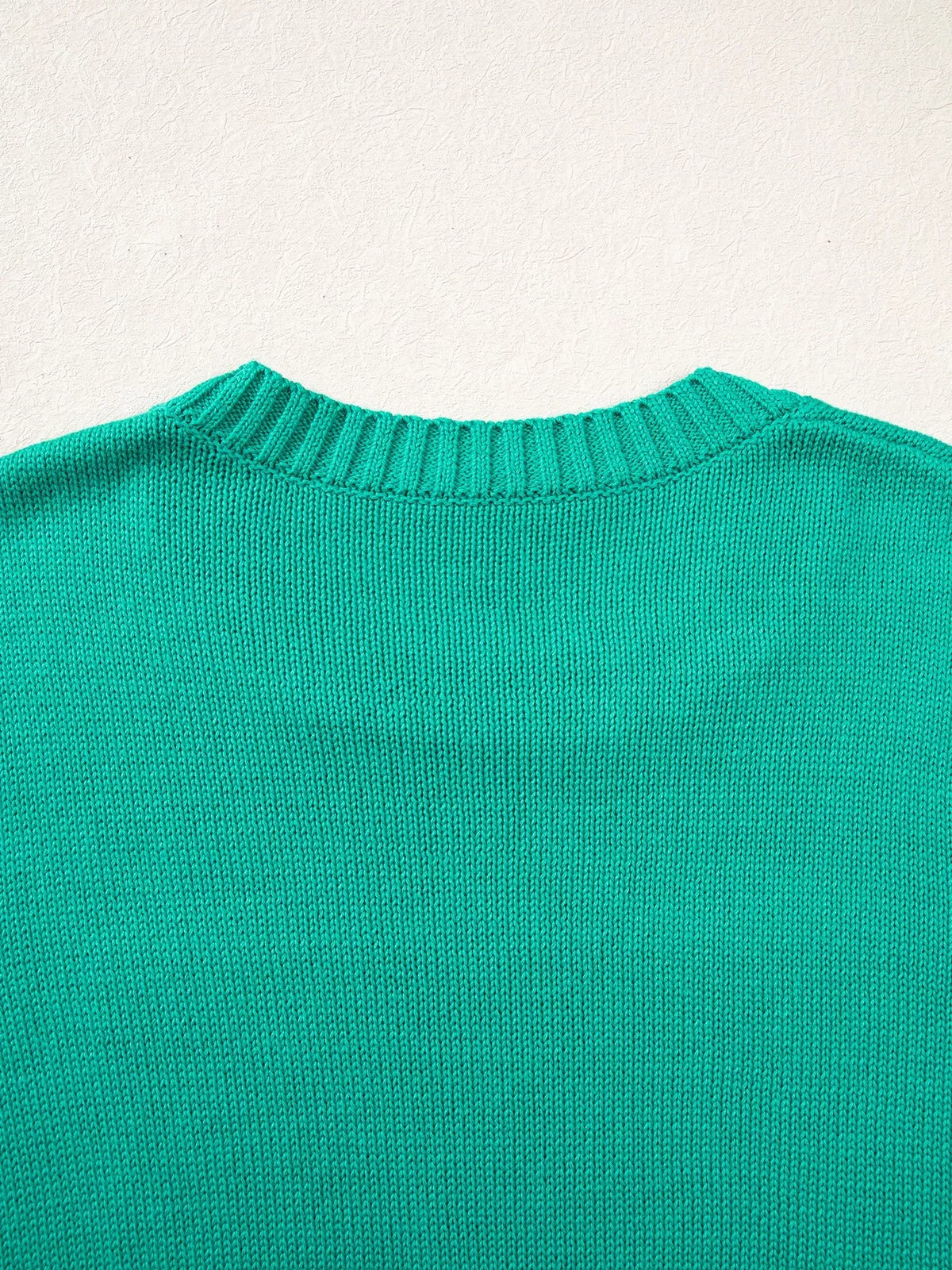 Merry sweater, green back neckline