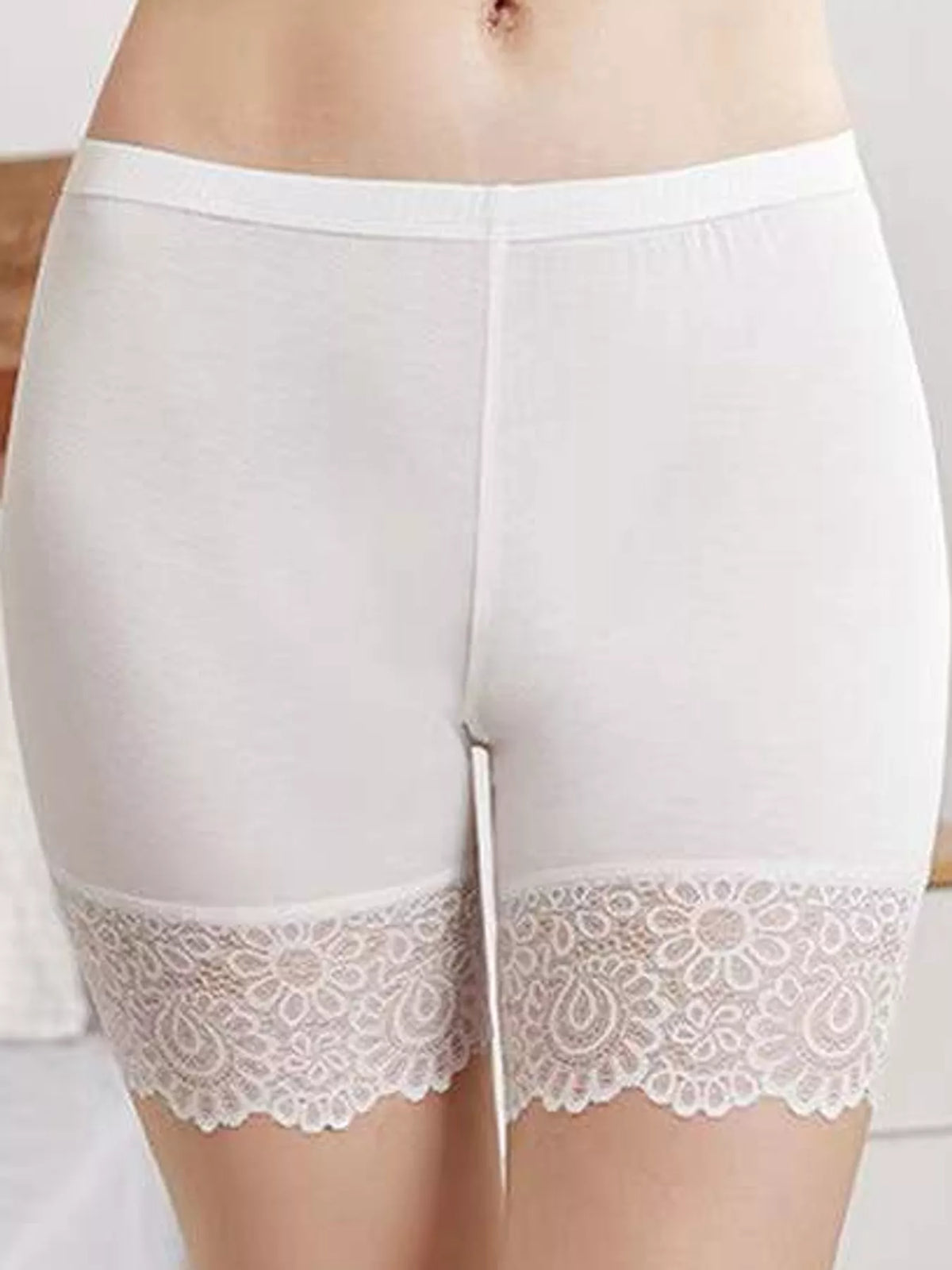 Lace-trim underpants, white front on model