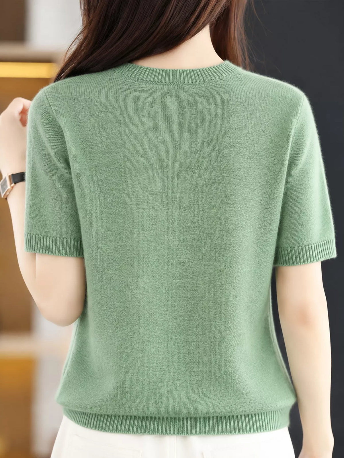 Green round neck short-sleeve sweater, back view
