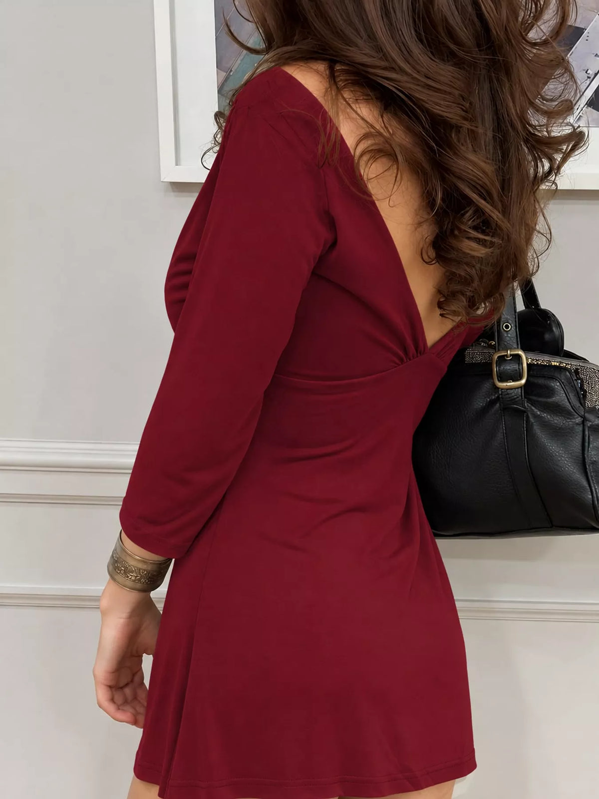 Plunging neck 3/4 sleeve mini dress, back view