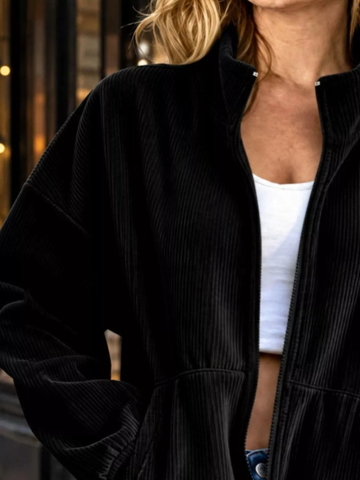 Black corduroy zip-up jacket, collar and zipper detail