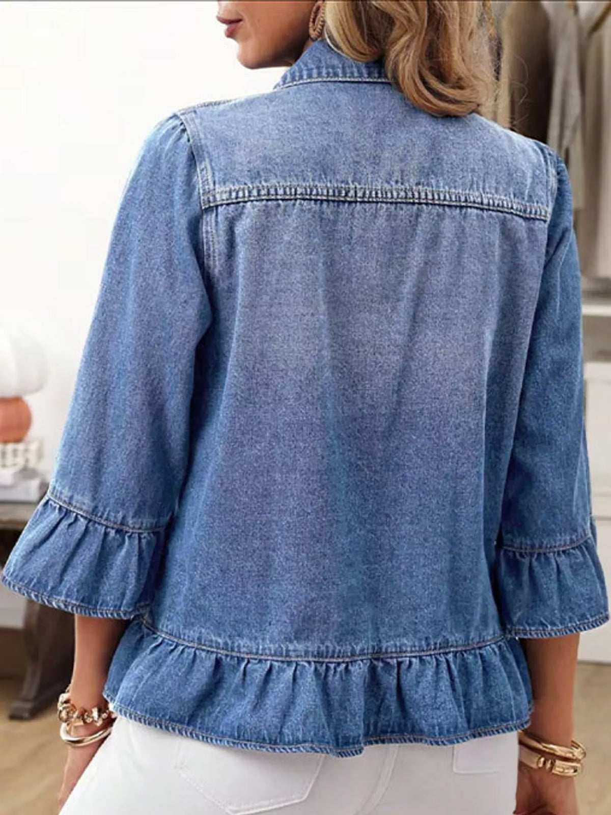 Blue ruffle hem denim jacket, back view