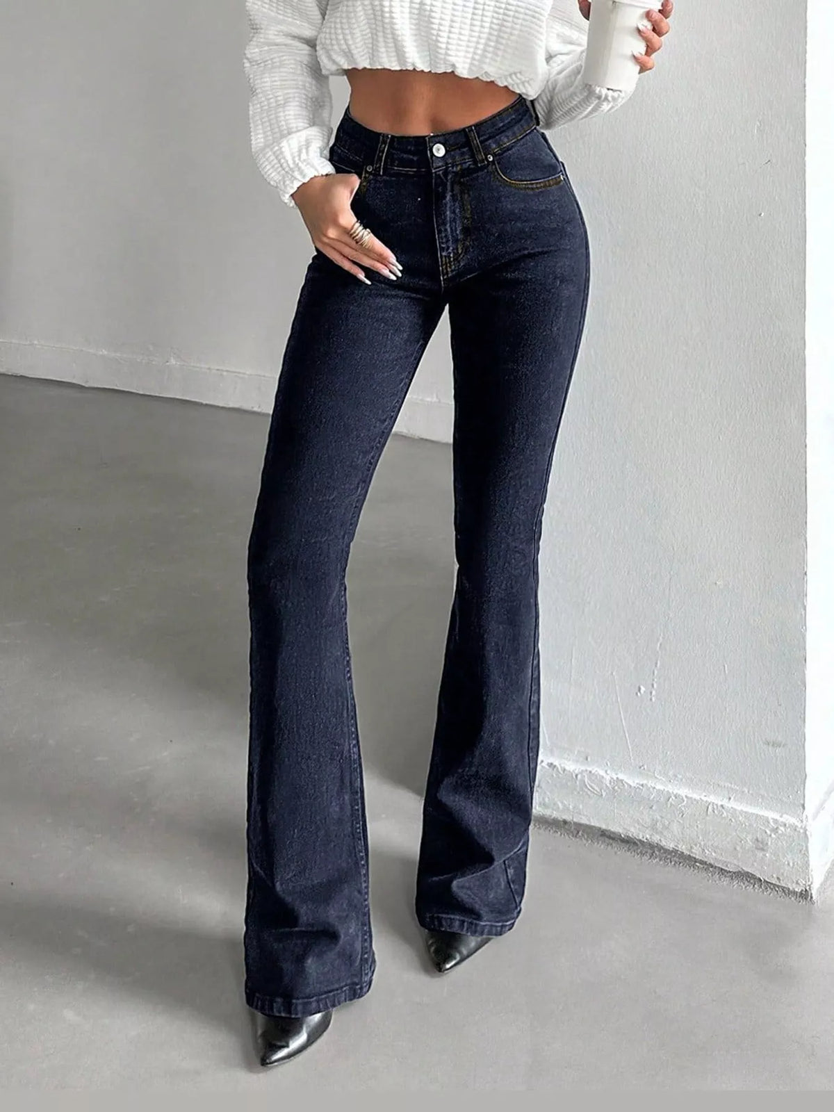 Black high-waisted slim-fit flared jeans