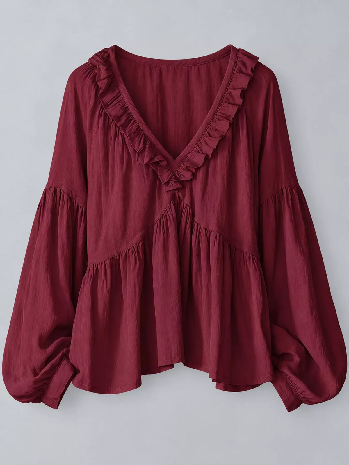 Burgundy ruffled v neck blouse, front view