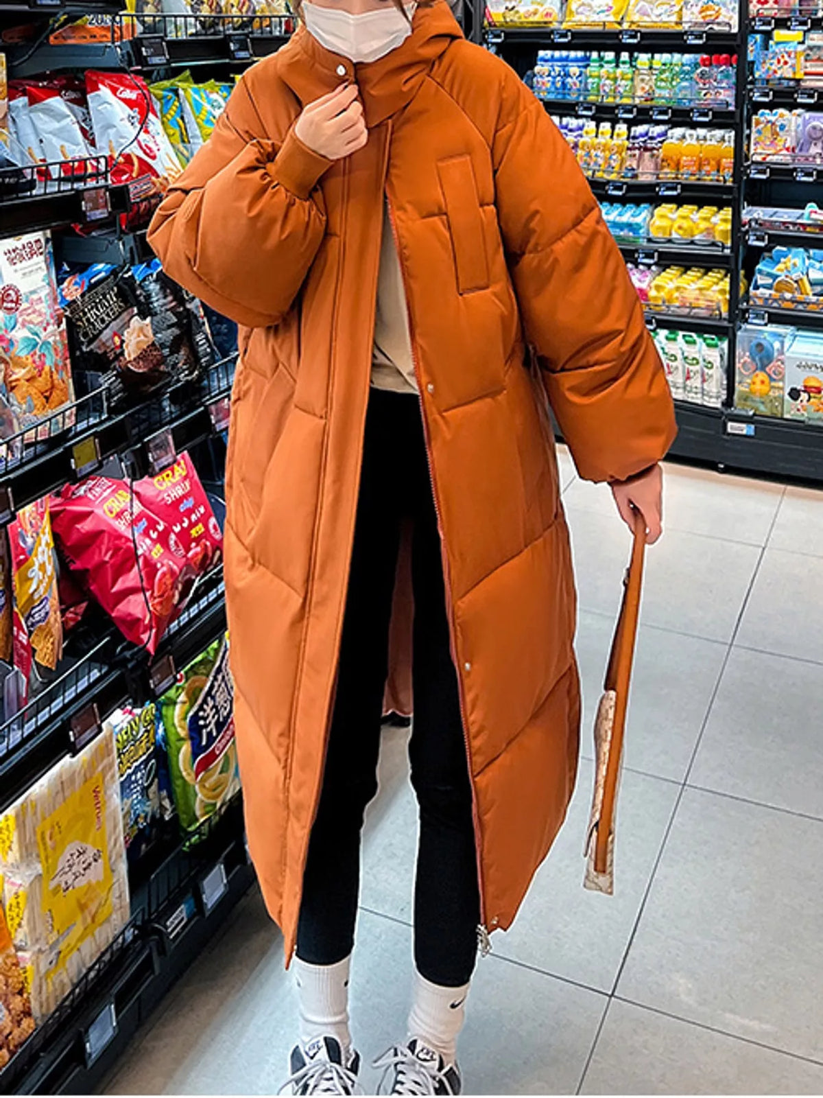 Longline puffer coat, orange zipped front