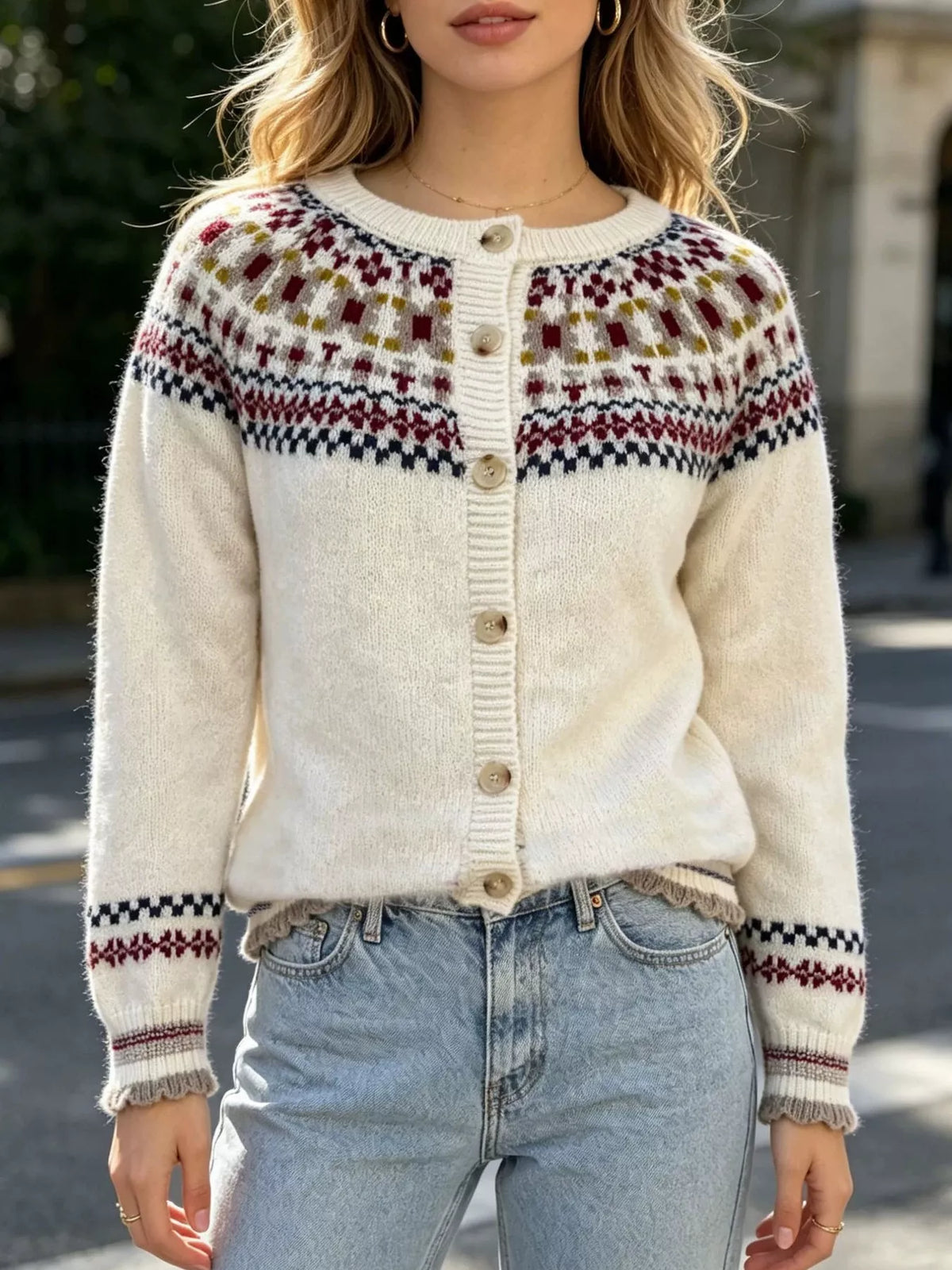 Cream fair isle button-front knit cardigan, front showing Fair Isle yoke.