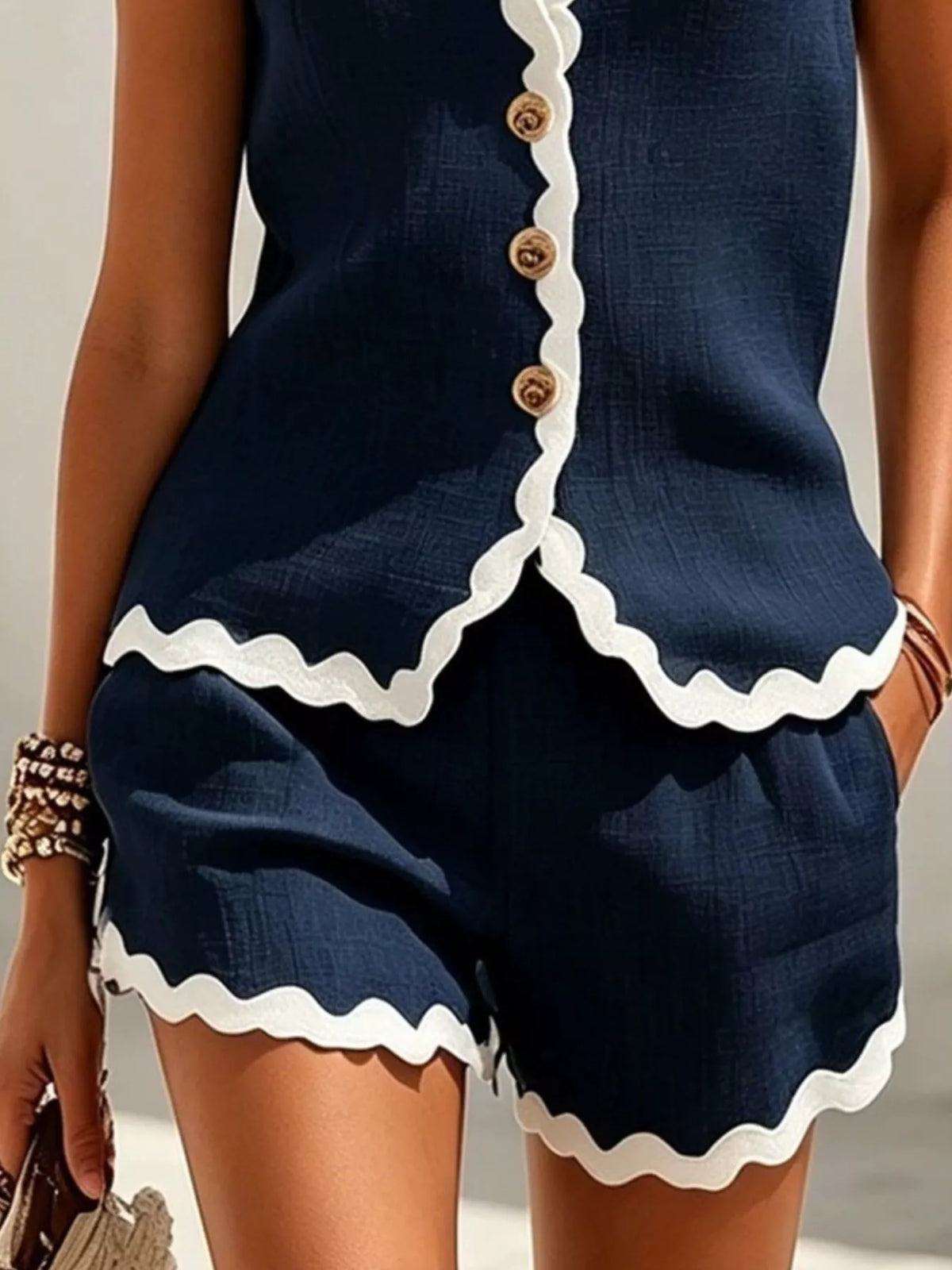 Navy and white scalloped top and shorts set, shorts and hem detail