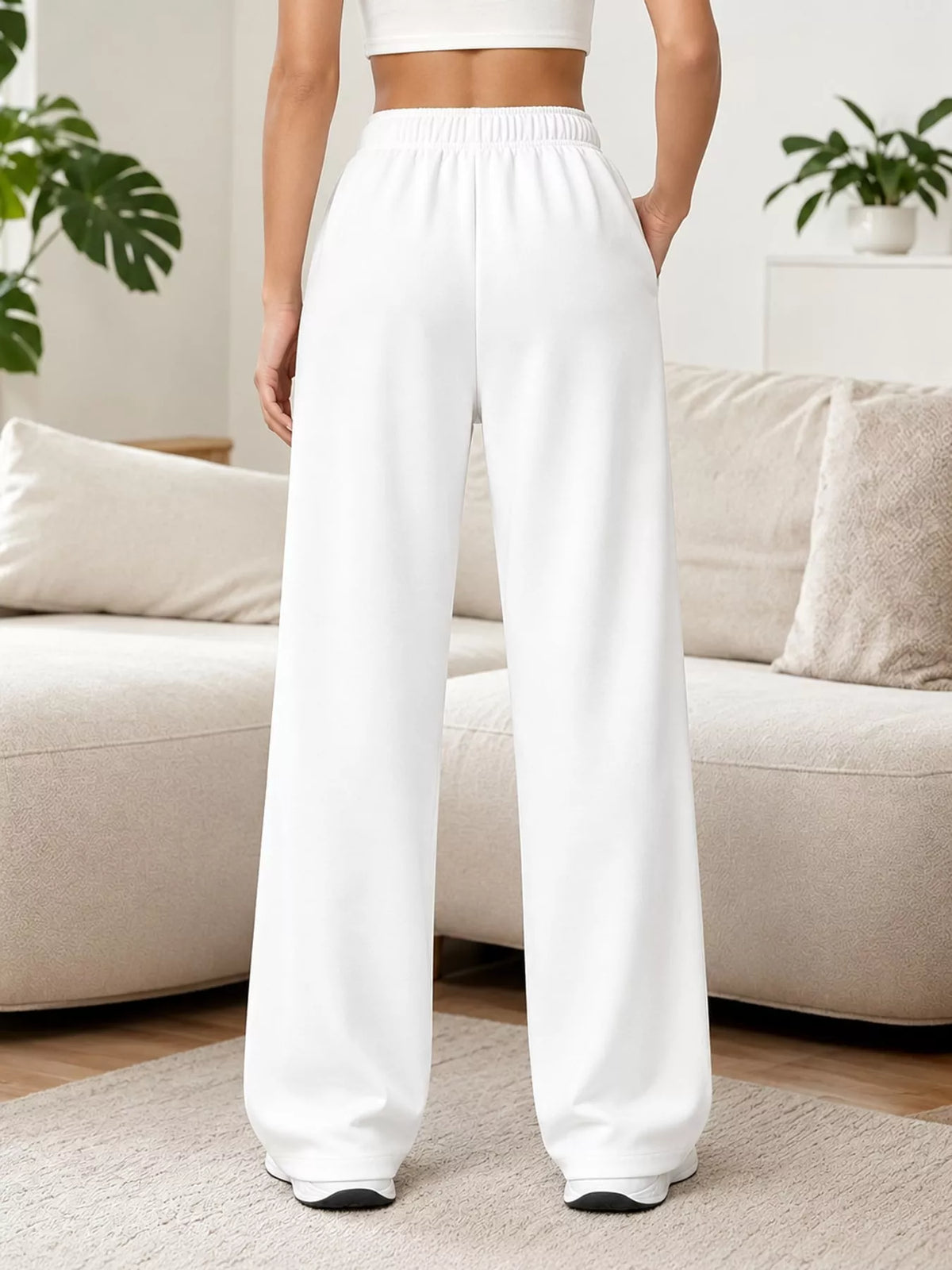White wide-leg pants with drawstring, back view