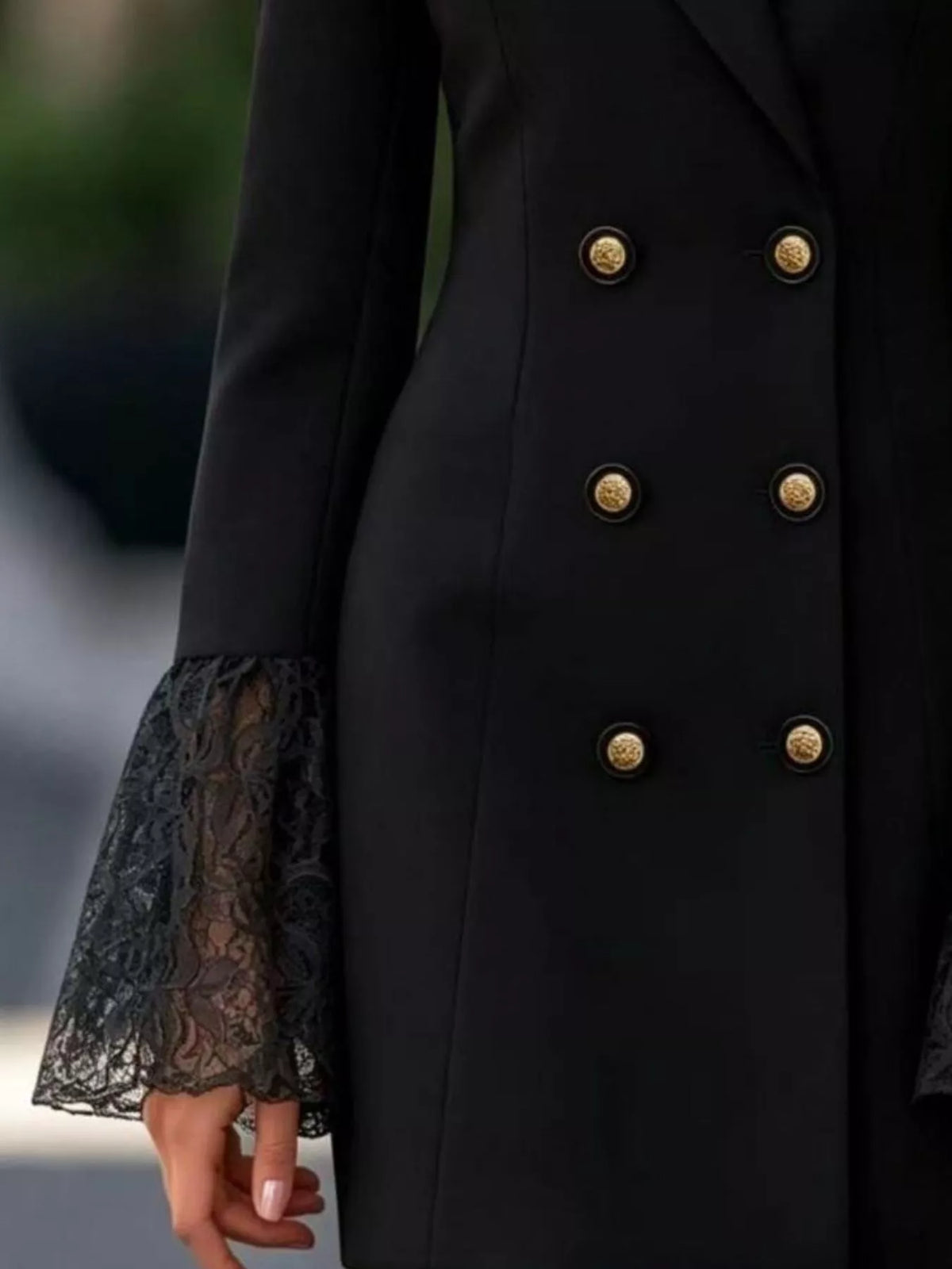 Black double-breasted blazer dress with lace flare cuffs, detail view