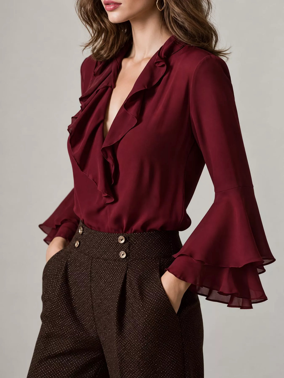 Burgundy ruffle-trim V-neck blouse with tiered bell sleeves, side view