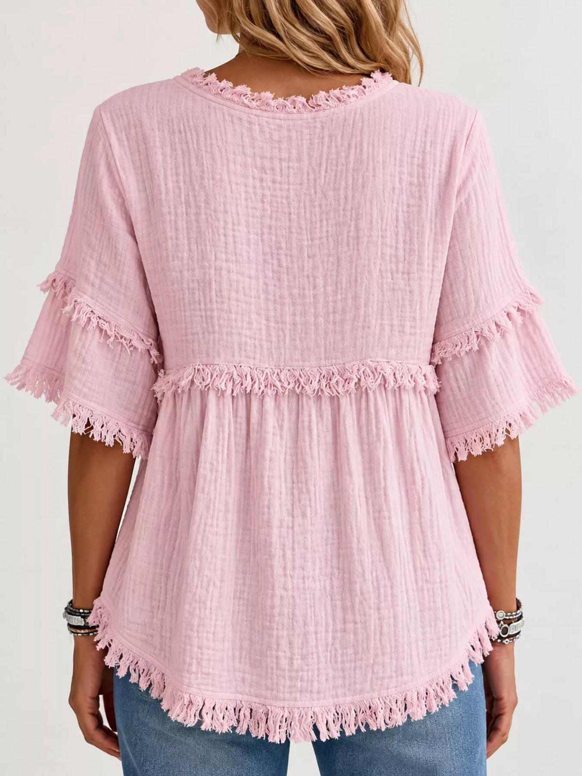 Pink frayed edge textured blouse, back view