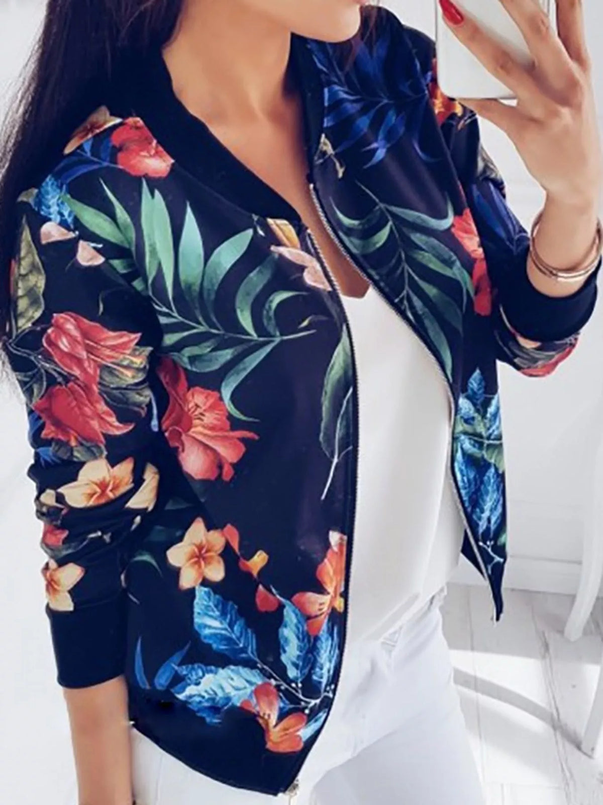 Navy tropical floral printed zip-up bomber jacket — front view