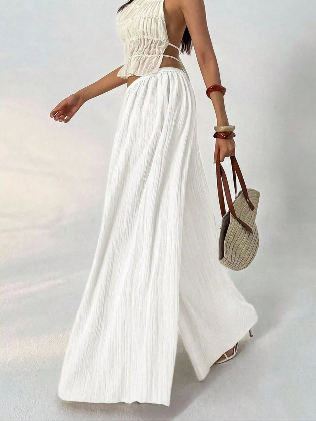 High-Waisted Pleated Wide-Leg Trousers, side view