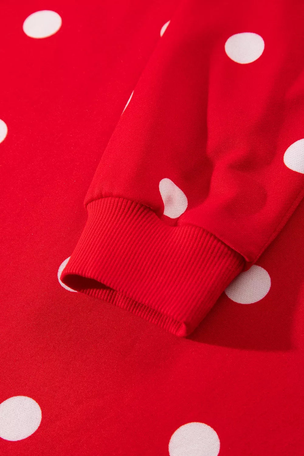 Polka Dot Raw Hem Top and Skort Set, cuff detail