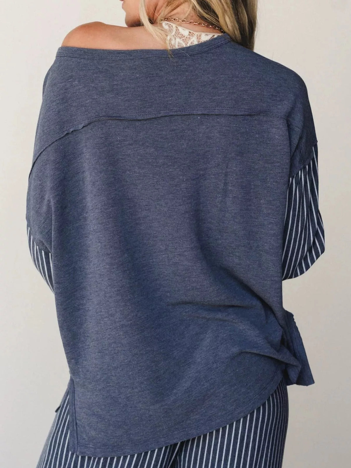 Blue striped boat neck top and wide-leg pants set, back view