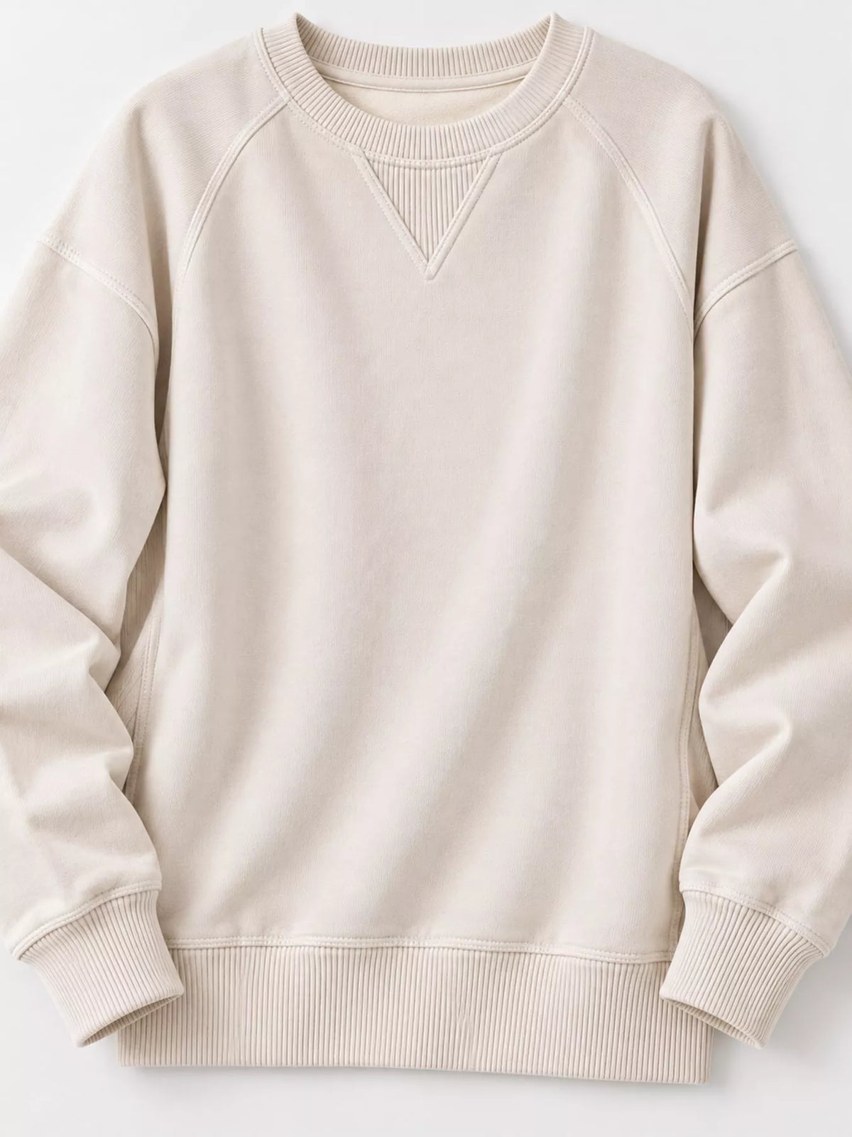 Cream crew neck raglan sleeve sweatshirt, front view with ribbed cuffs and hem