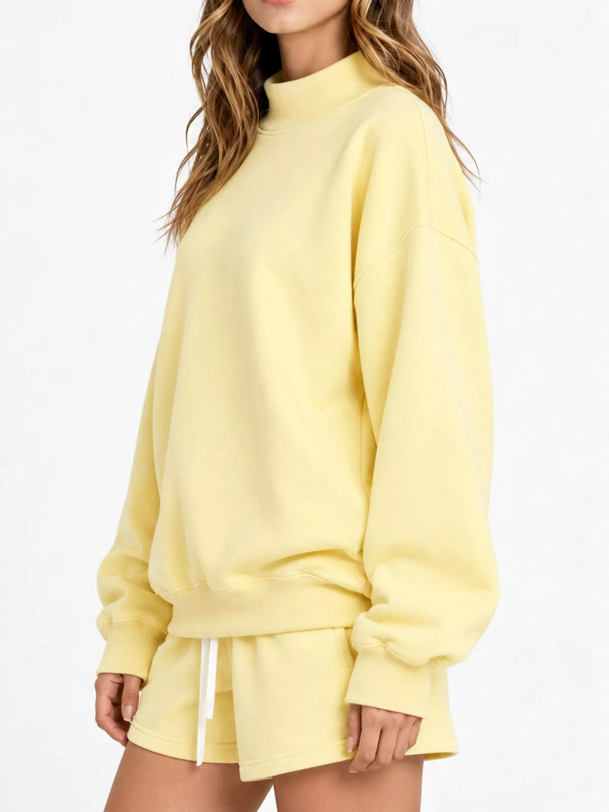 Light yellow oversized dropped shoulder sweatshirt, side view