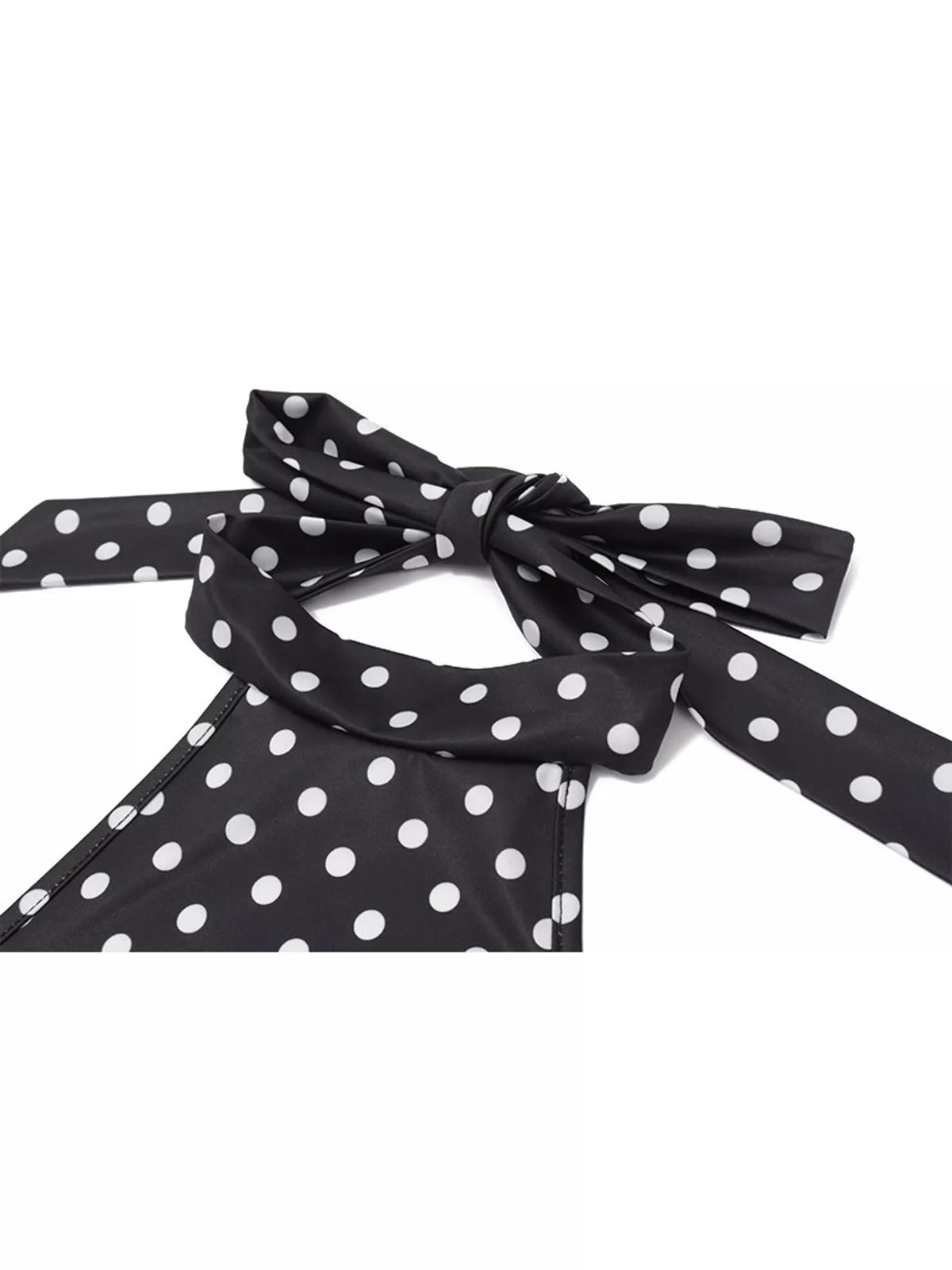 Black and white polka dot halter neck mini dress, detail view