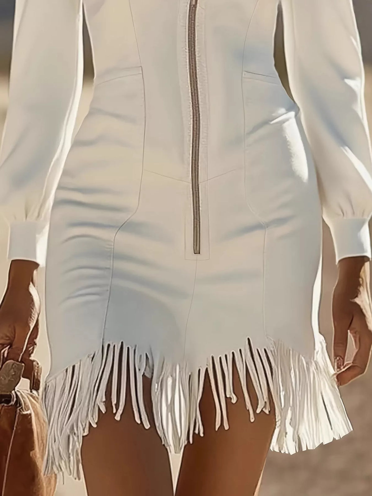 White zip front long sleeve fringe mini dress, detail view