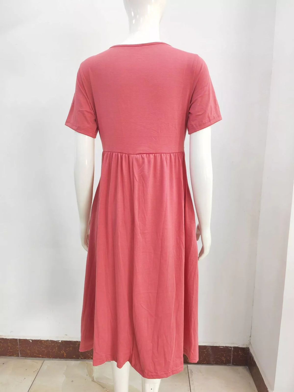 Pink crisscross short sleeve midi dress, back view