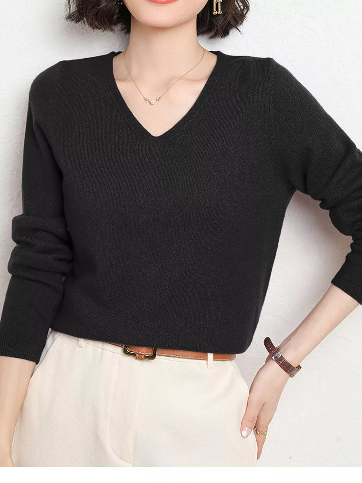 Black v-neck long sleeve knit top
