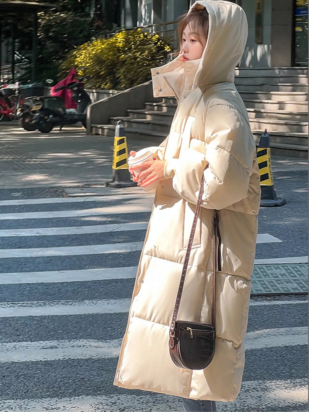 Longline puffer coat, cream hooded side