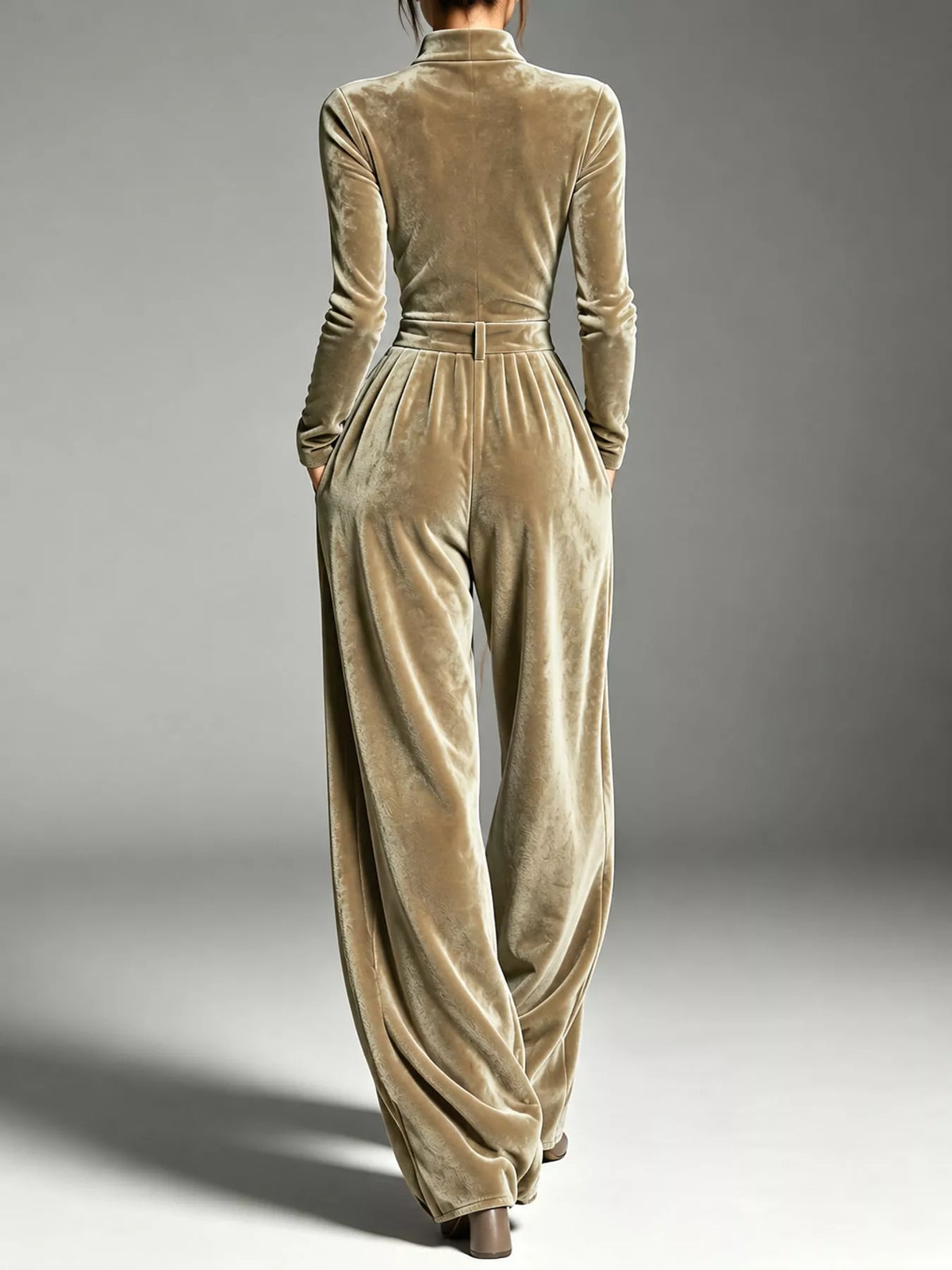 Beige velvet zip up jumpsuit with tie waist, back view