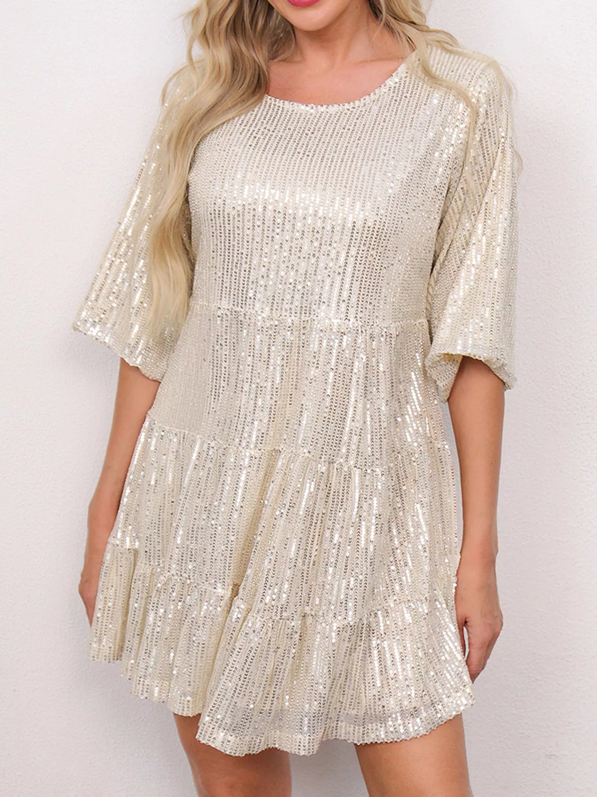 Round neck 3/4 sleeve mini dress, front view on model