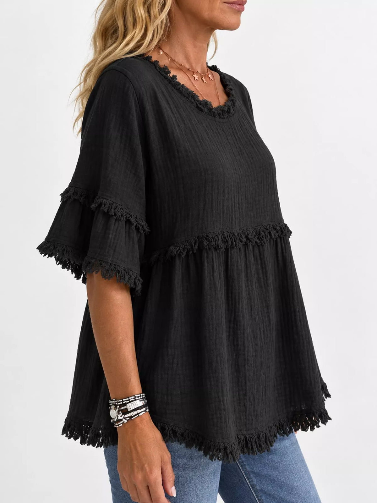 Black frayed edge textured blouse, side view