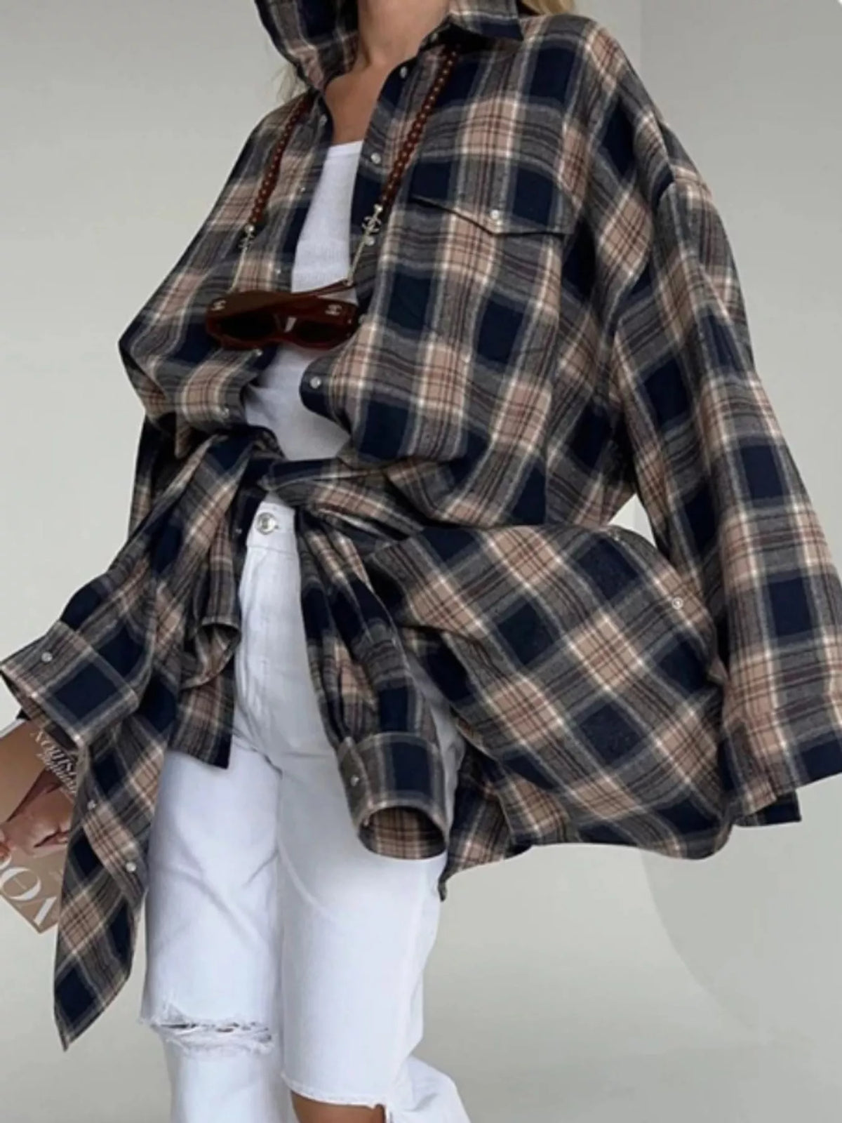 Beige and navy plaid button-up shirt with chest pockets