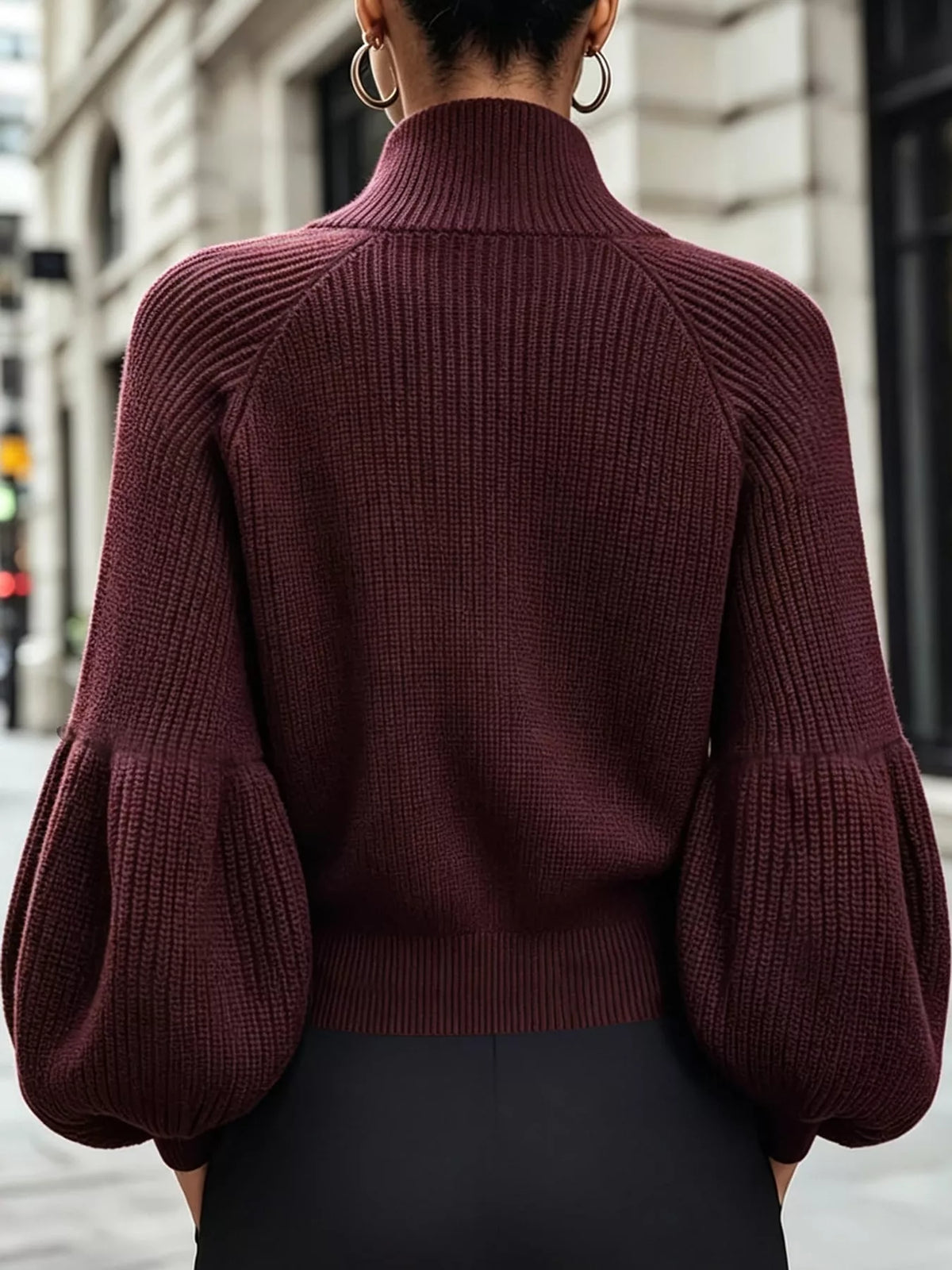 Burgundy ribbed knit zip-up cardigan with lantern sleeves, back view