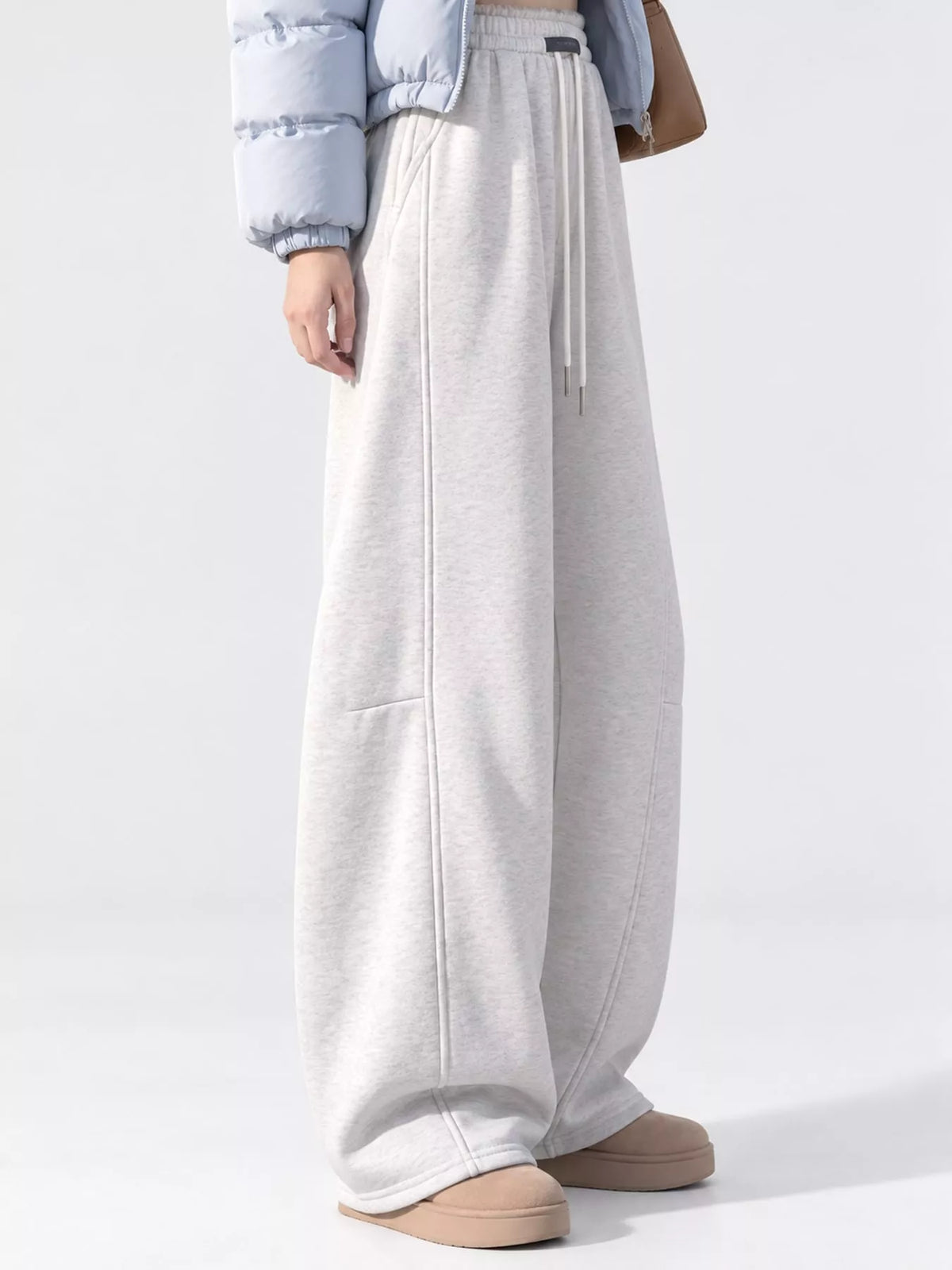 Light gray wide leg drawstring sweatpants, front view