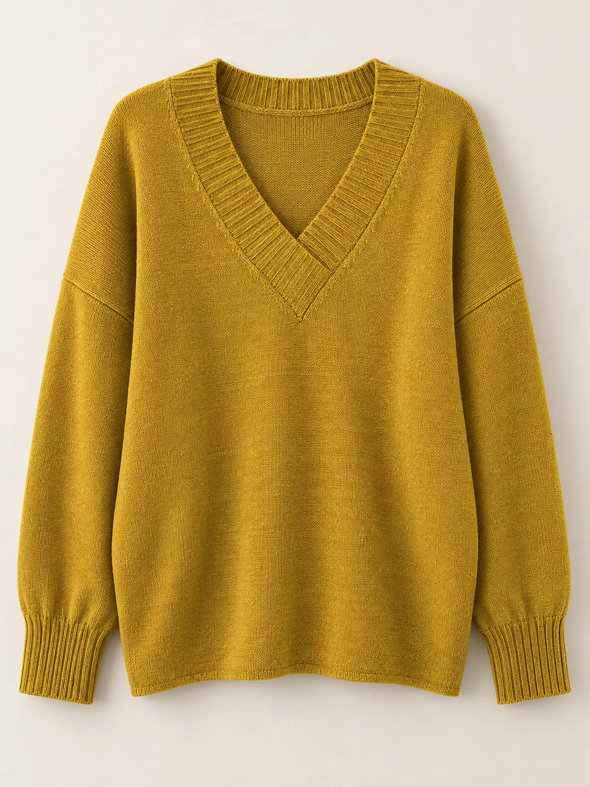 V-neck sweater, mustard flat lay