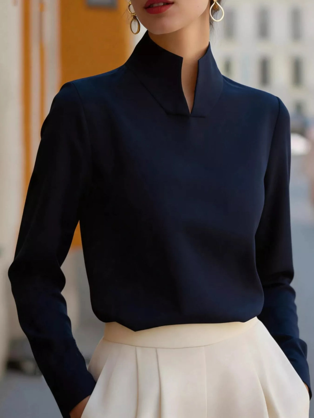 Mandarin neck long sleeve blouse, front view on model