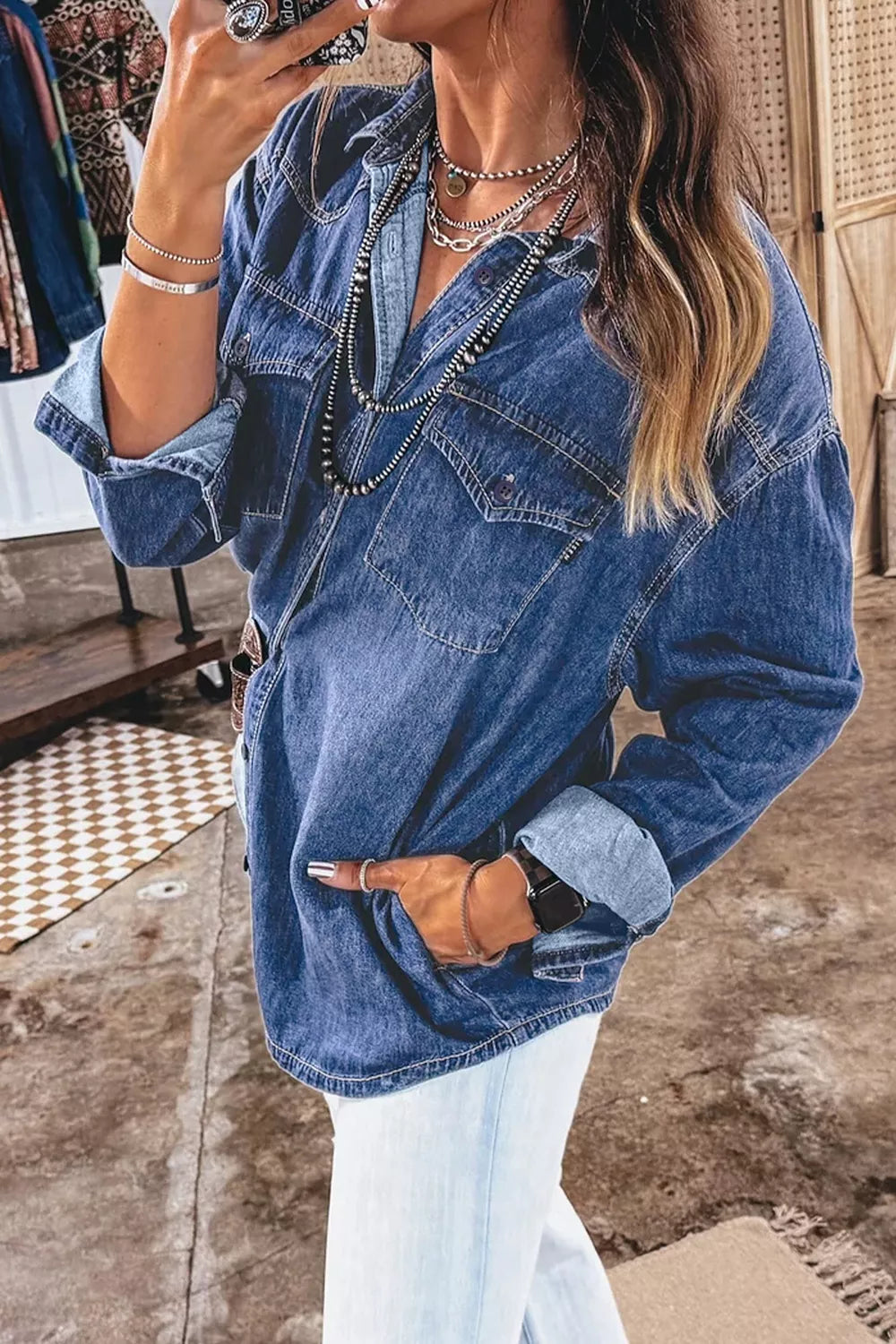 Blue western pocket denim tunic shirt, rolled sleeve view