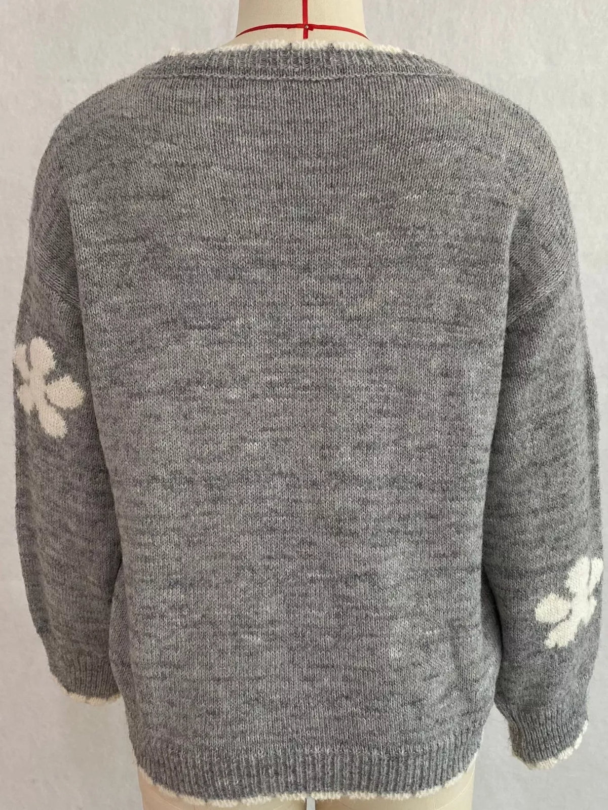 Floral-applique knit cardigan in gray, mannequin back view