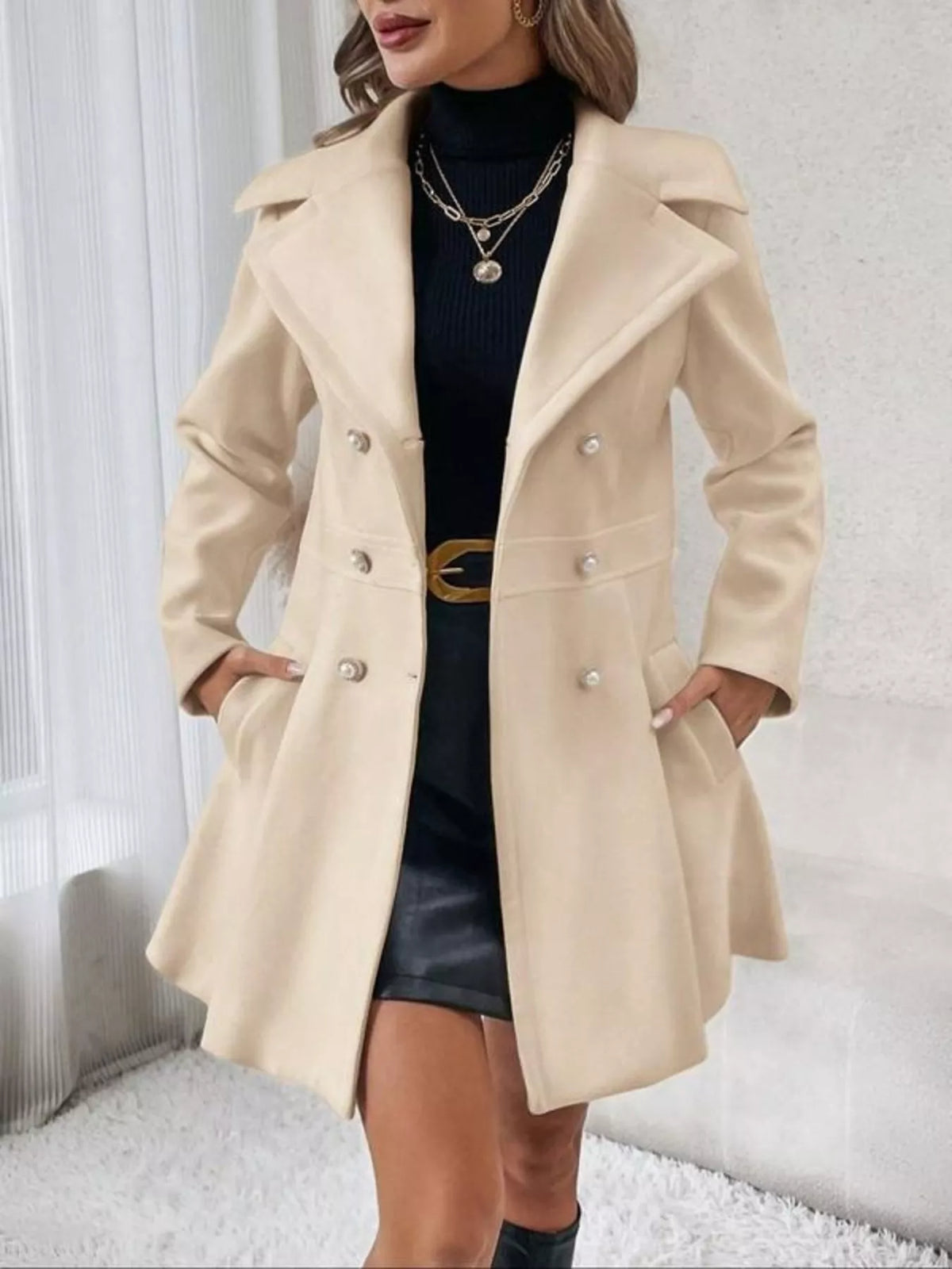 Beige double-breasted peplum coat, open front view