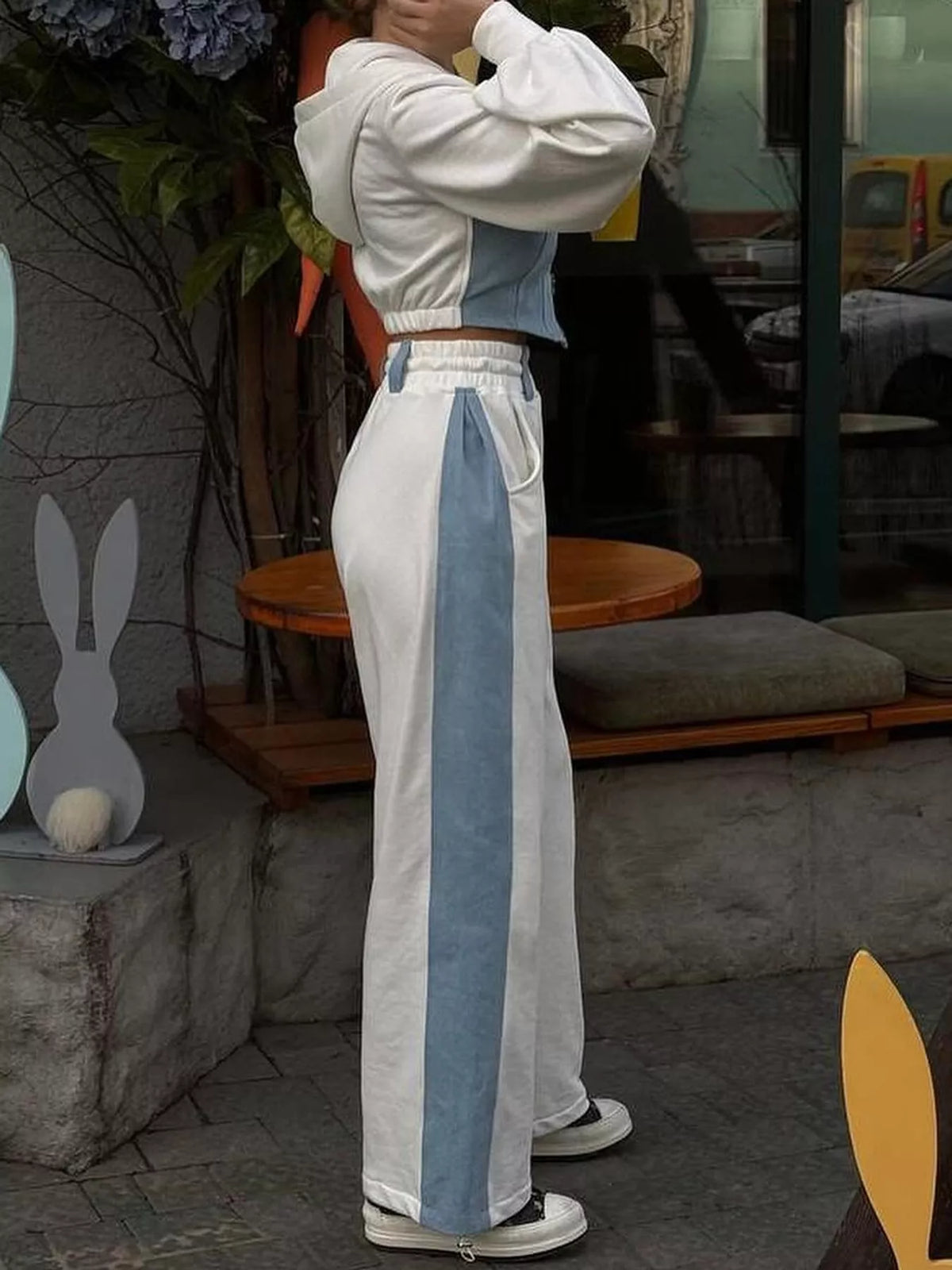 White and light blue color-block zip-up hoodie and wide-leg pants set — back view