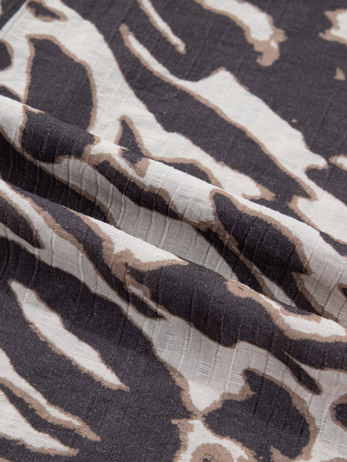 Leopard Print V Neck Button Down Balloon Sleeve Shirt in dark brown, construction detail