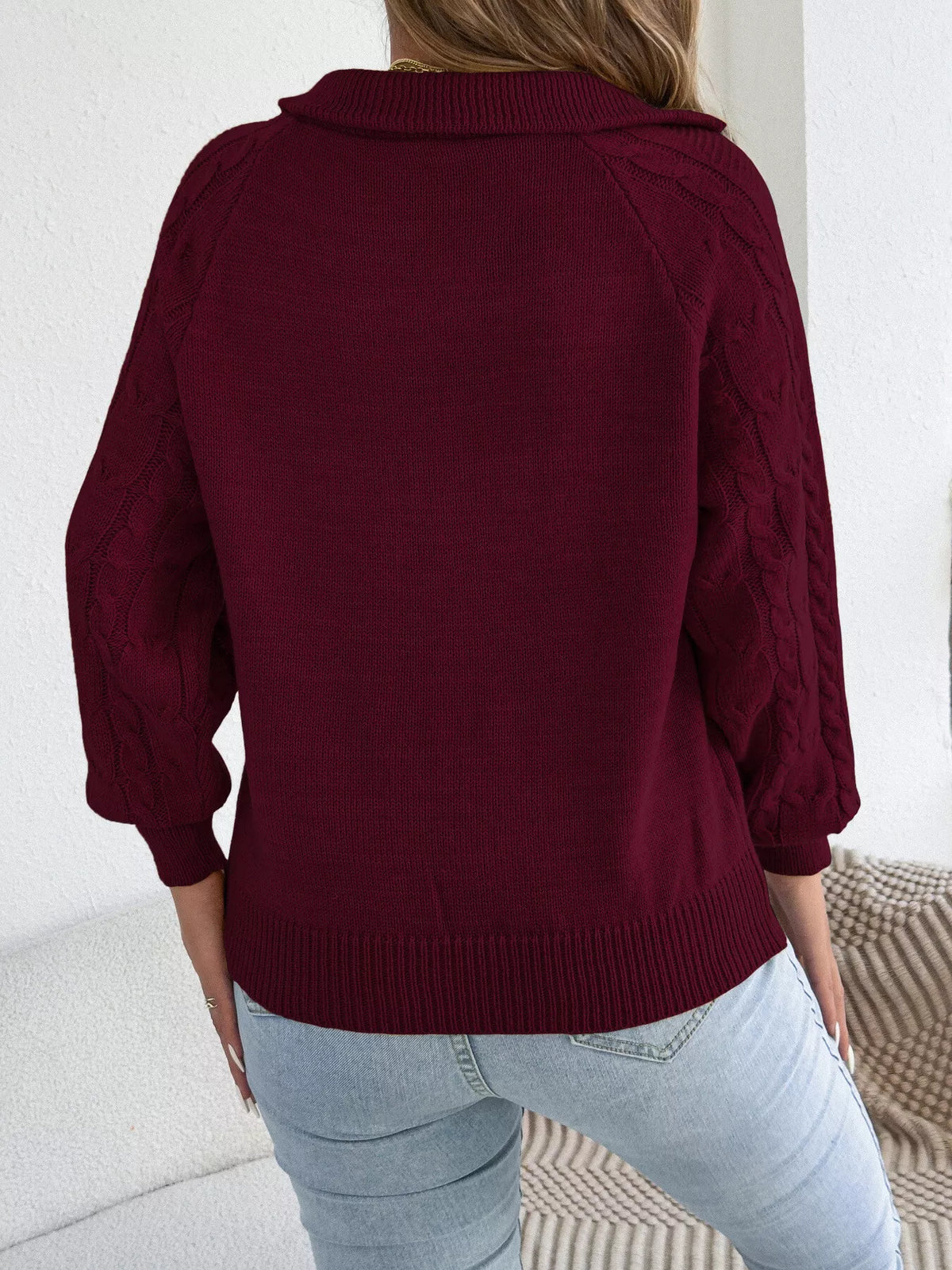 Burgundy quarter-zip cable knit sweater, back view