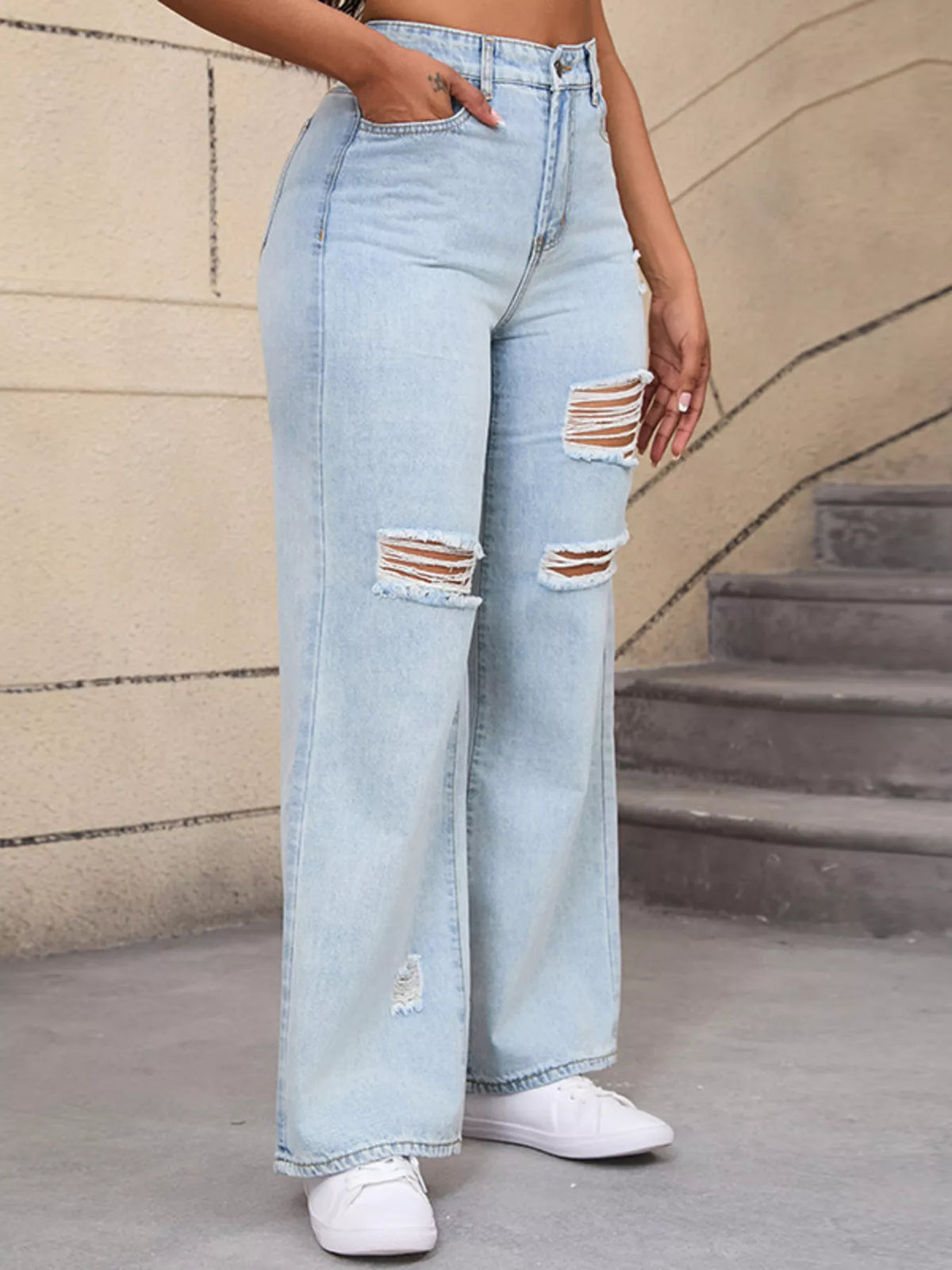 Light blue distressed wide-leg jeans, side view