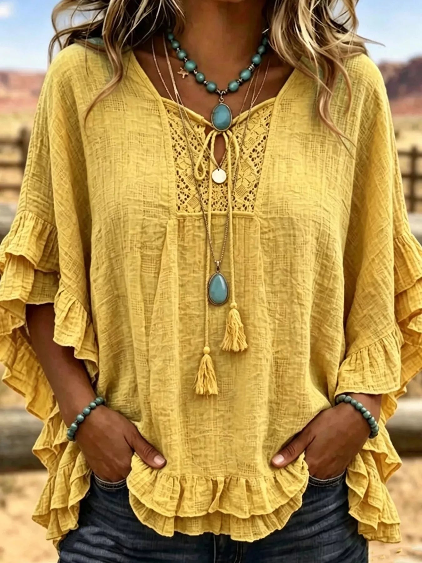 Trendsi Full Size Tassel Tie Neck Ruffled Hem Blouse Plus Size -