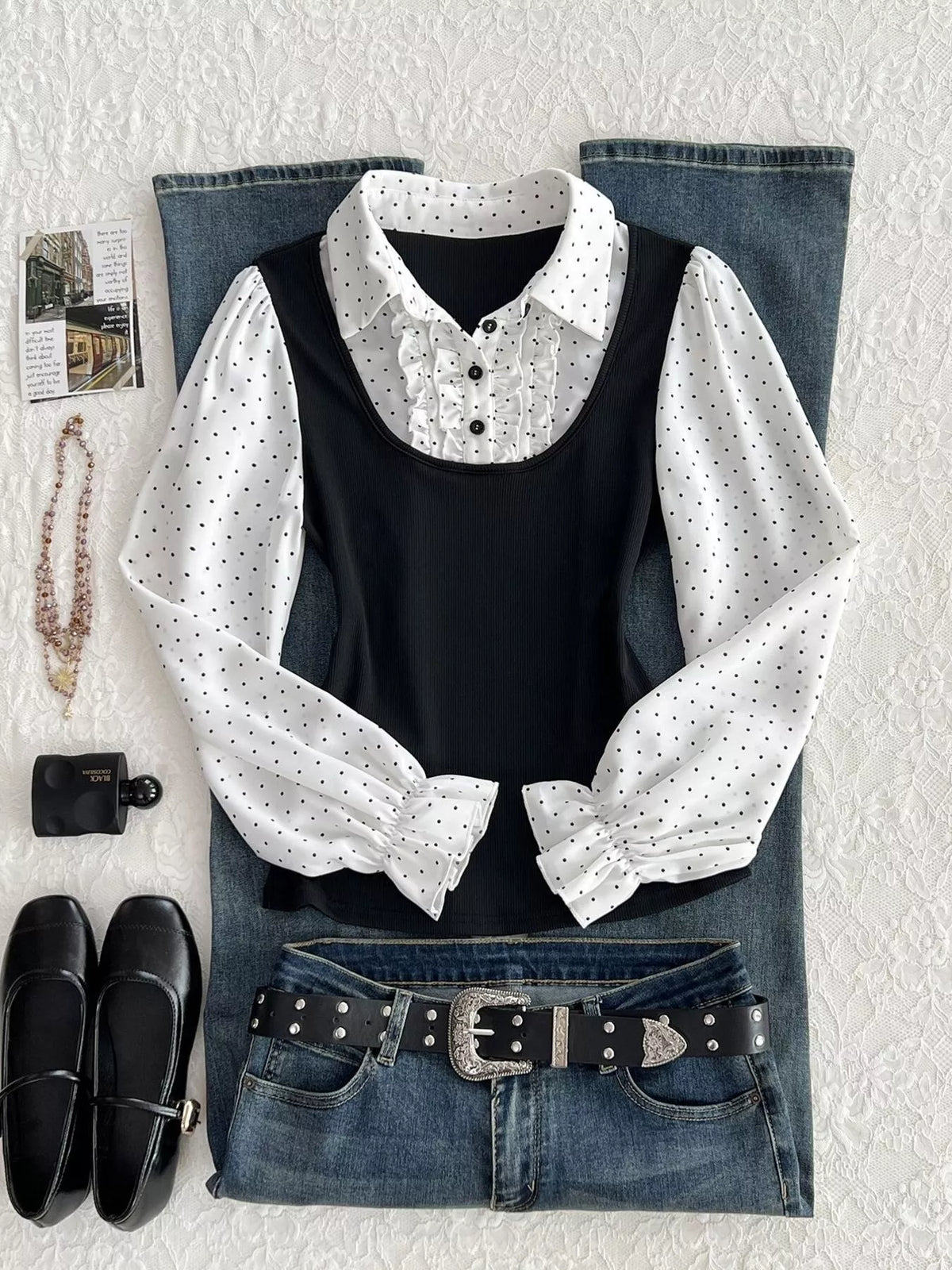 Polka-dot blouse, black and white flat lay