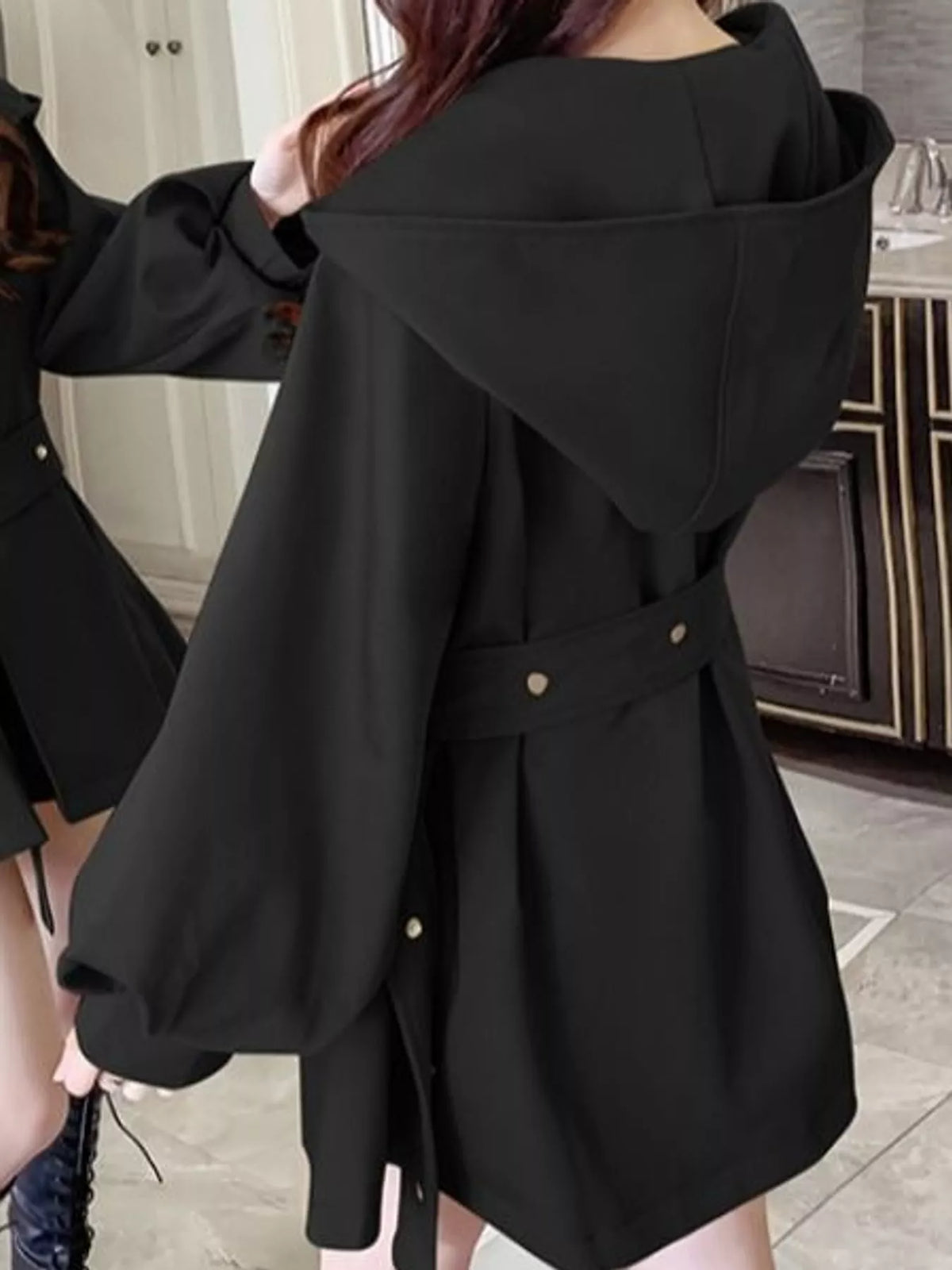 Black lantern sleeve hooded belted jacket, back view
