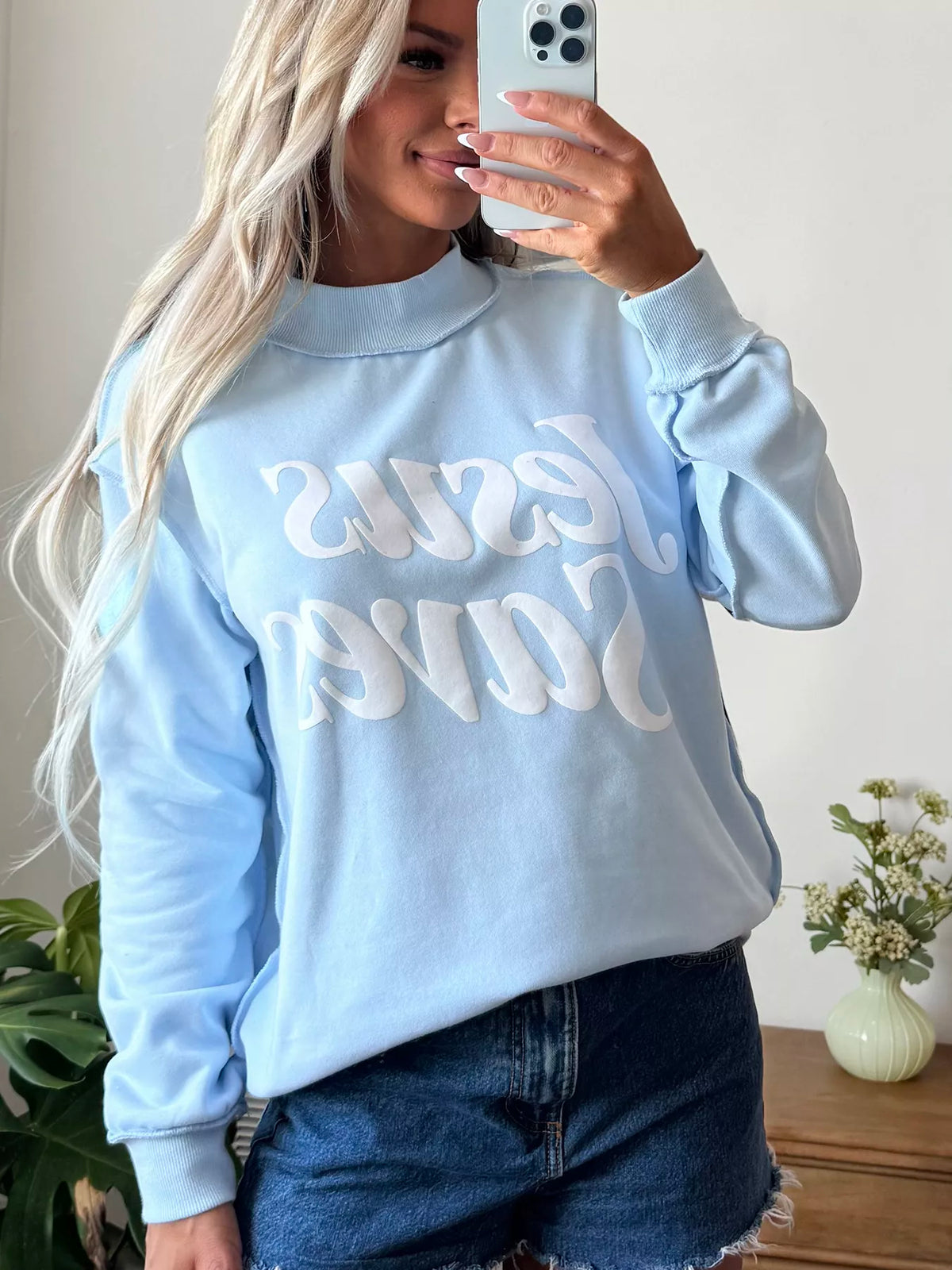 Light blue jesus saves stand neck oversized sweatshirt — front view